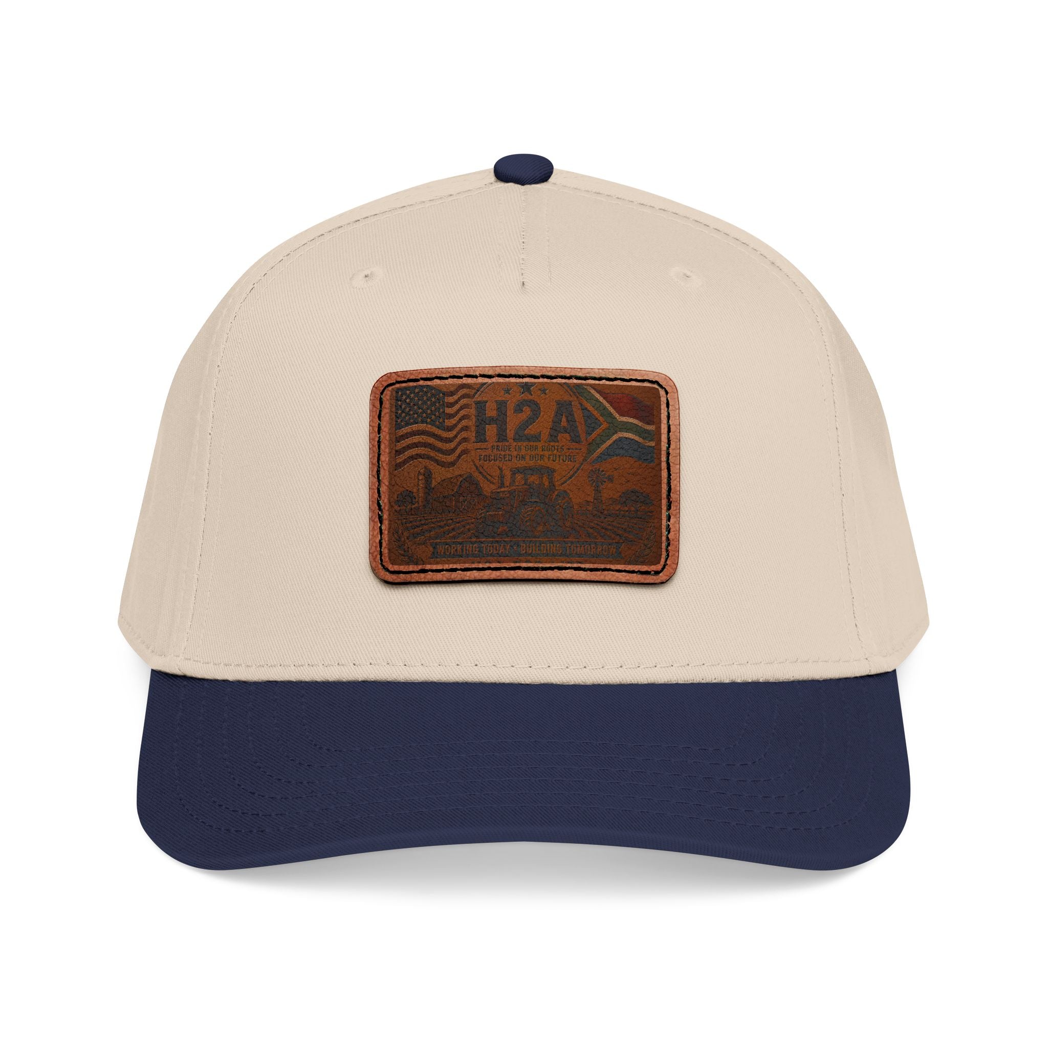 Two-tone baseball cap with H2A leather patch; tan crown and navy brim
