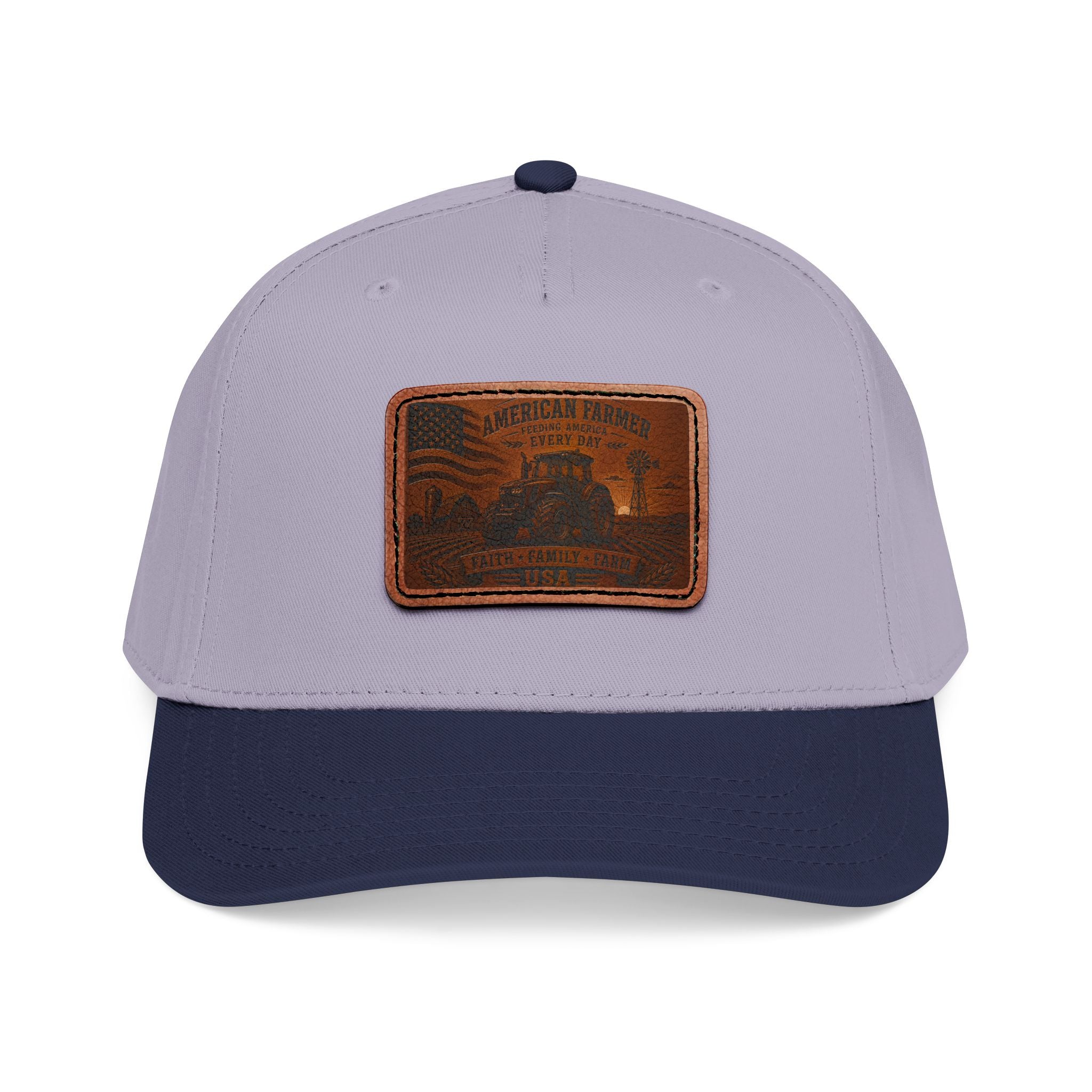 Baseball cap in light gray and dark navy with rectangular leather patch on front
