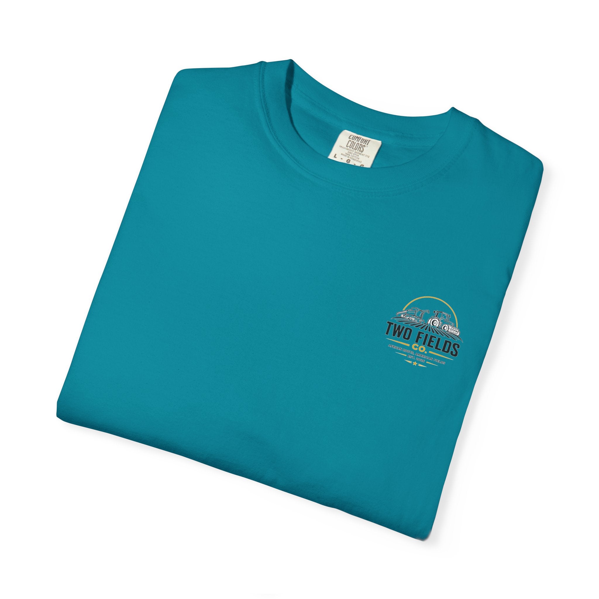 Teal blue T-shirt folded, small Two Fields Co arched logo on the chest