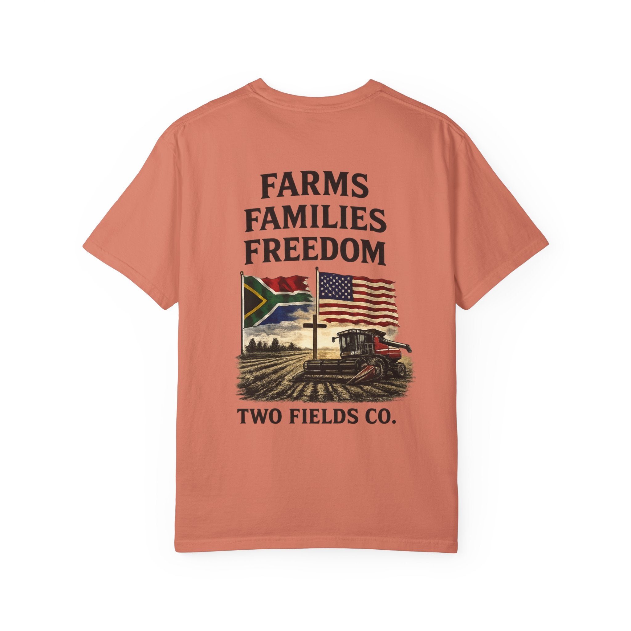 Salmon-pink short-sleeve farm tractor graphic t-shirt with “FARMS FAMILIES FREEDOM”