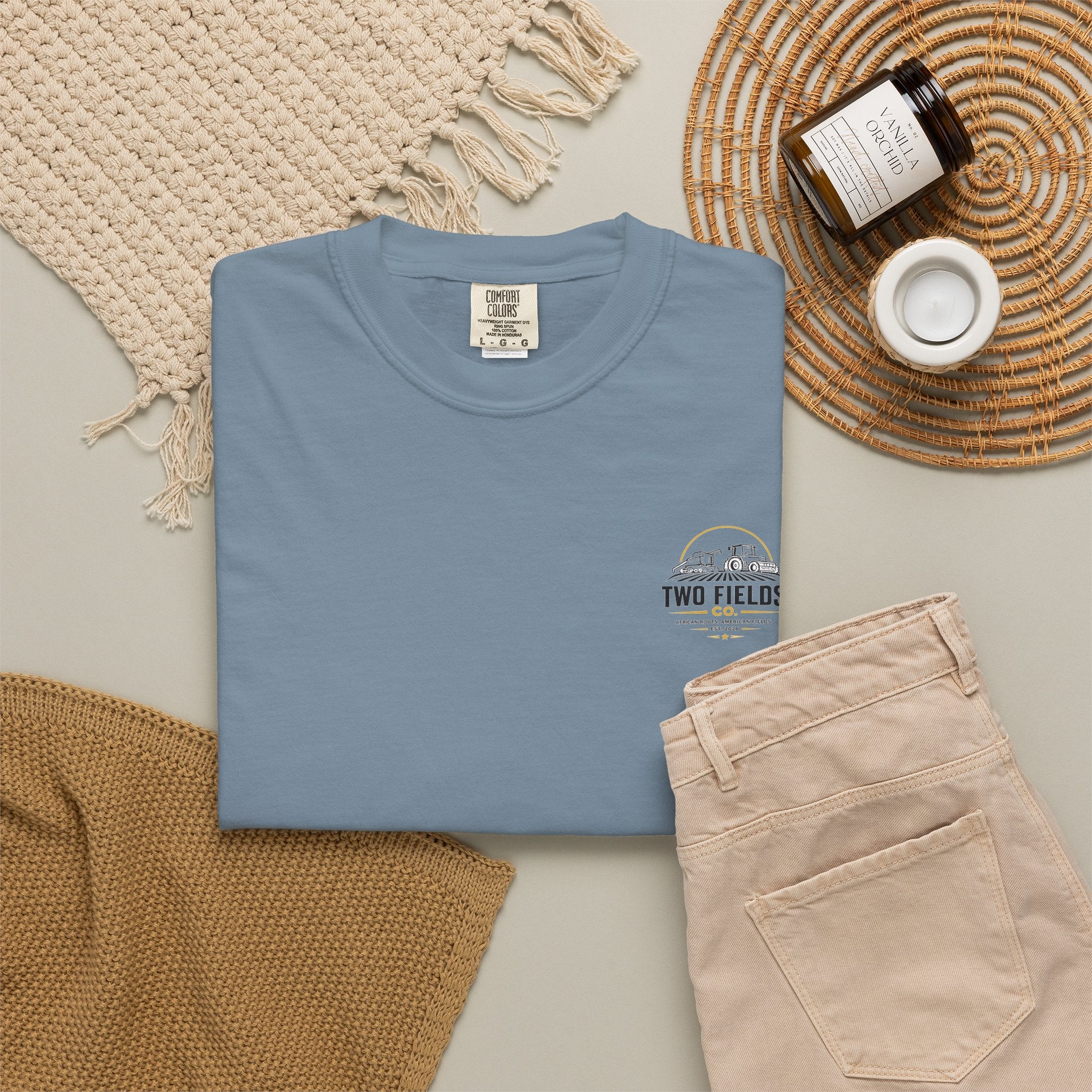 Heather blue T-shirt featuring small chest “Two Fields Co.” logo graphic