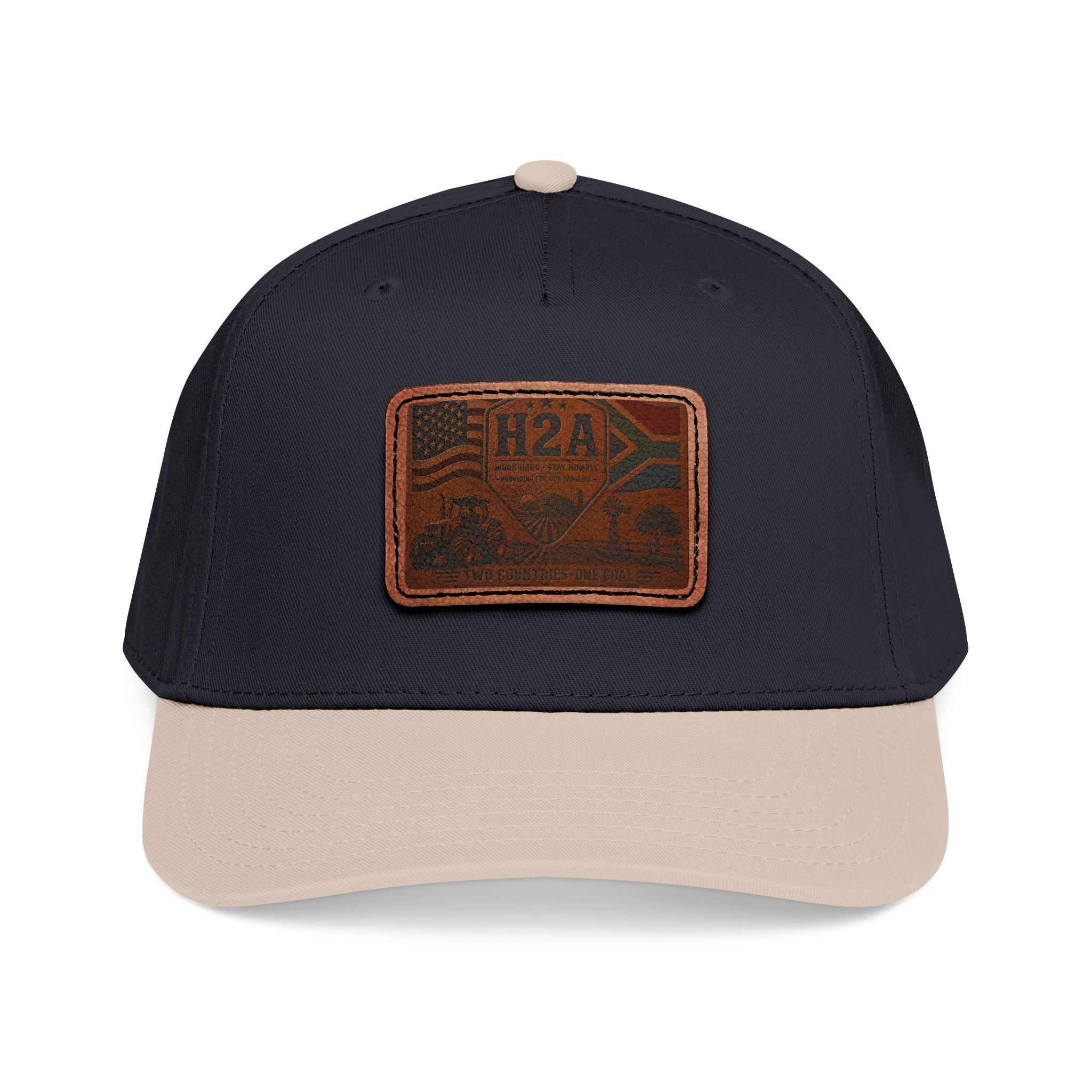 Mid-profile baseball cap in dark navy with tan brim and rectangular H2A leather patch.