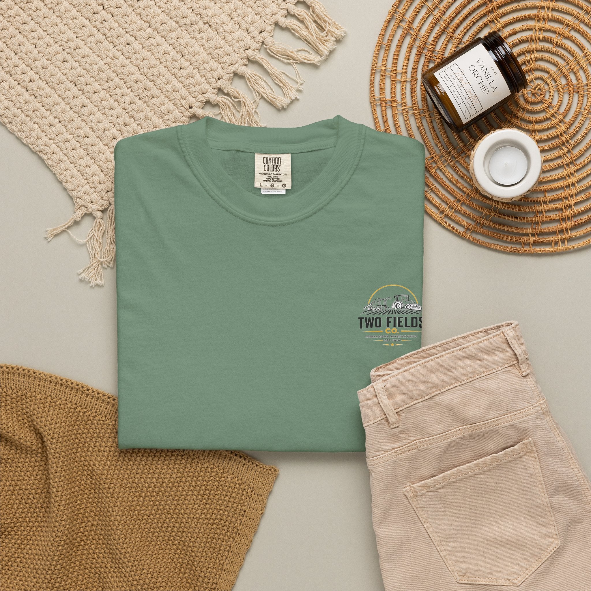 Green family farm graphic T-shirt with small tractor and logo on chest