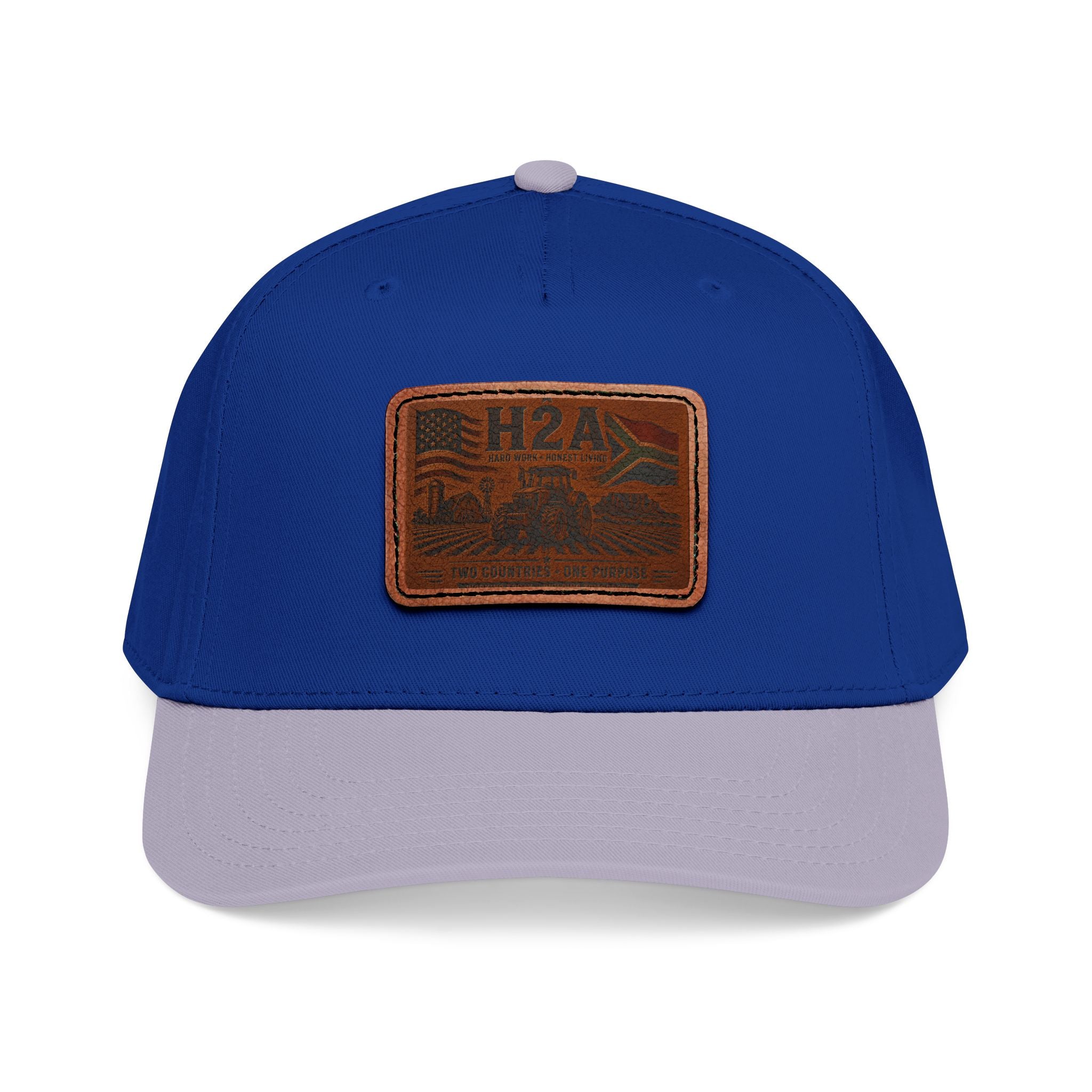 Royal blue baseball cap with beige brim and rectangular leather patch H2A outdoor logo
