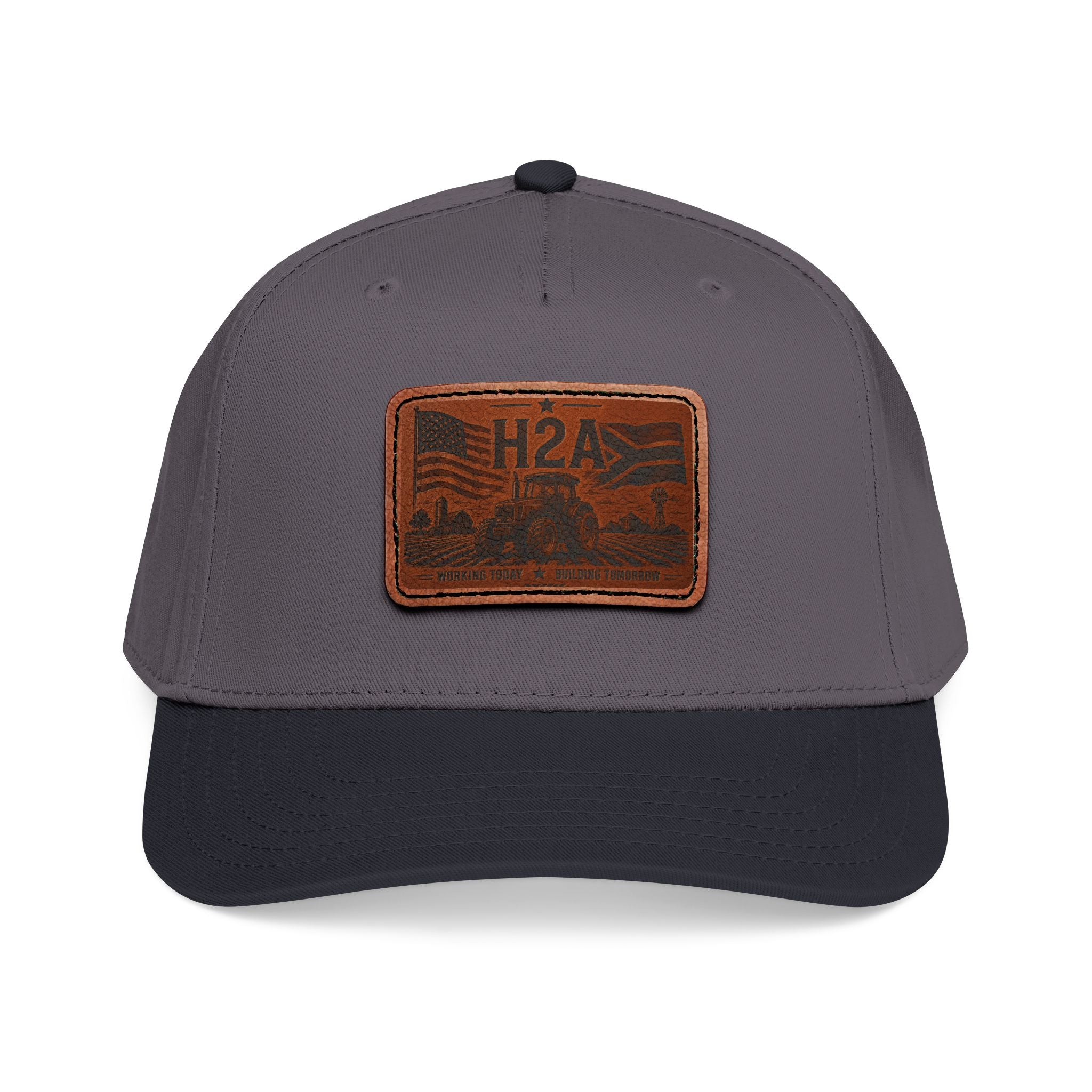 Dark gray trucker baseball cap with dark navy brim and brown leather-look H2A patch.