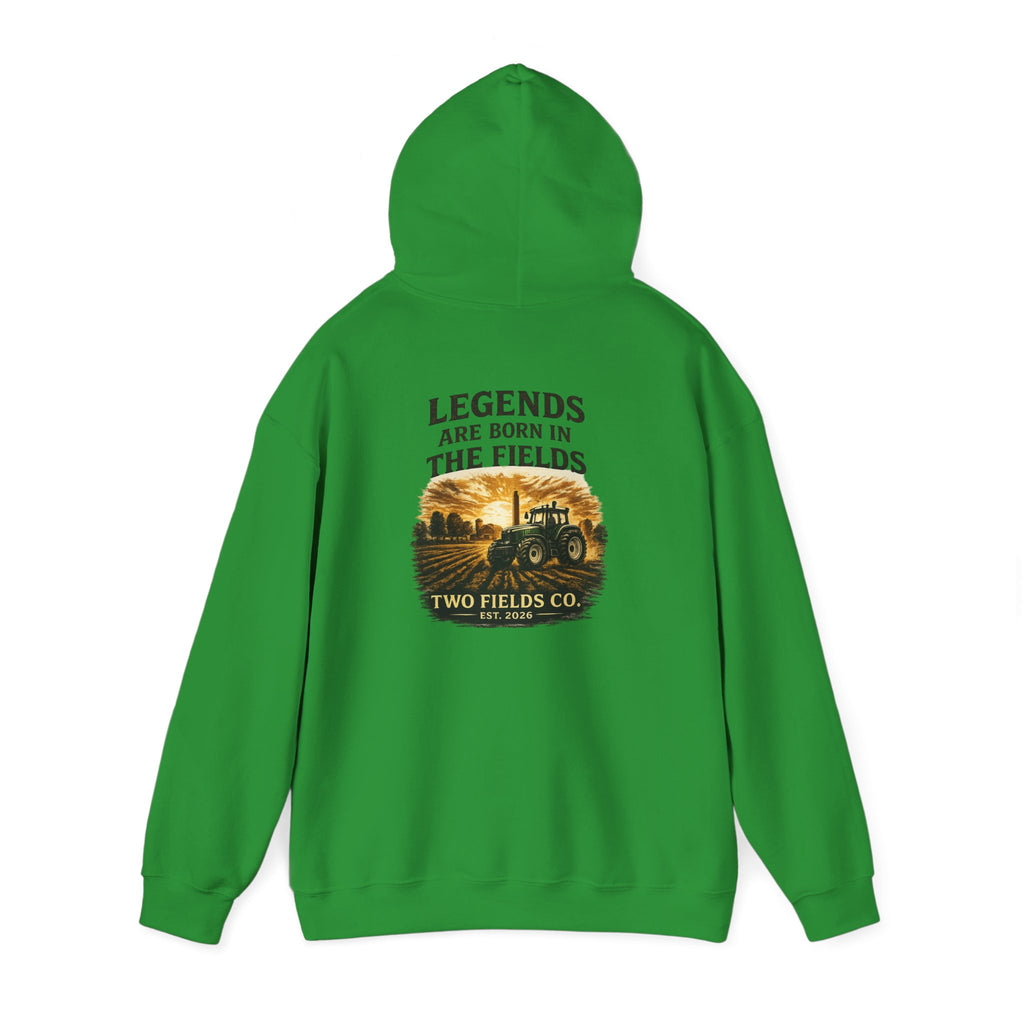 Green pullover hoodie with tractor field graphic on the back and drawstring hood