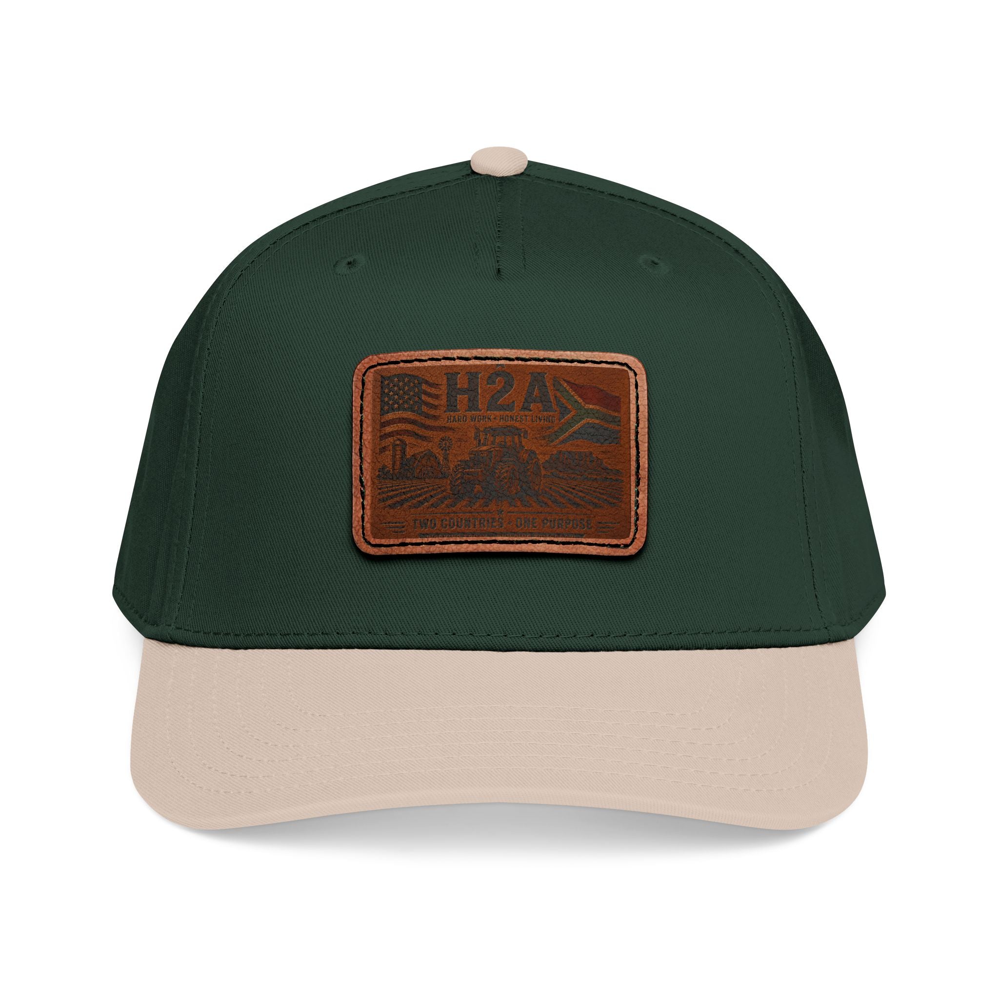 Two-tone baseball cap in dark green and beige with rectangular leather patch logo