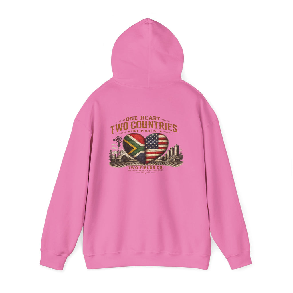 Light pink pullover hoodie with heart-shaped flag graphic on the back and drawstring hood