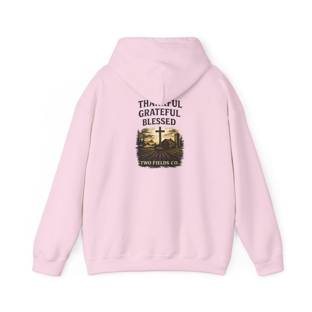 Pink pullover hoodie with hood and pouch, large chest print featuring a cross