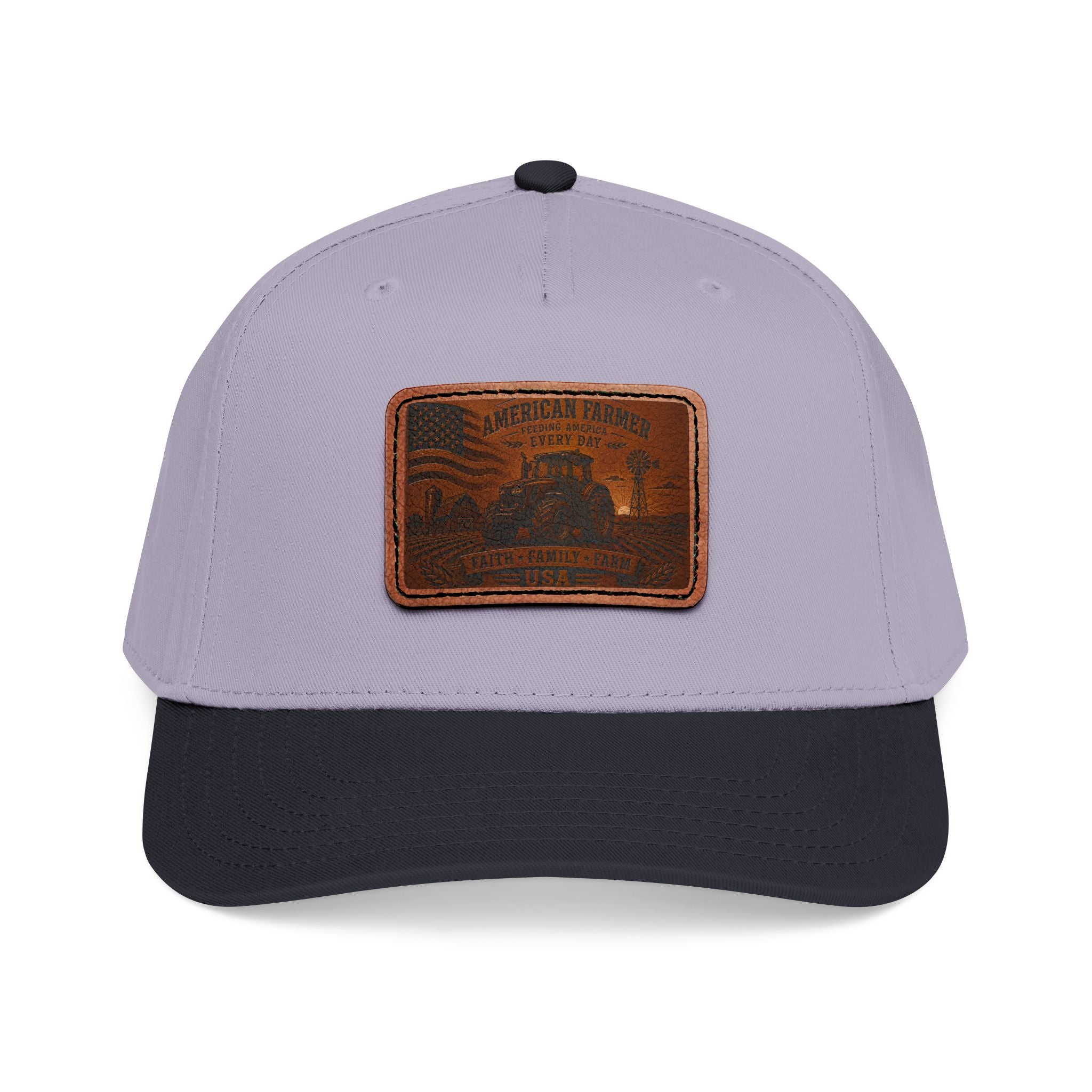 Baseball cap in light gray and dark navy with rectangular leather patch on front