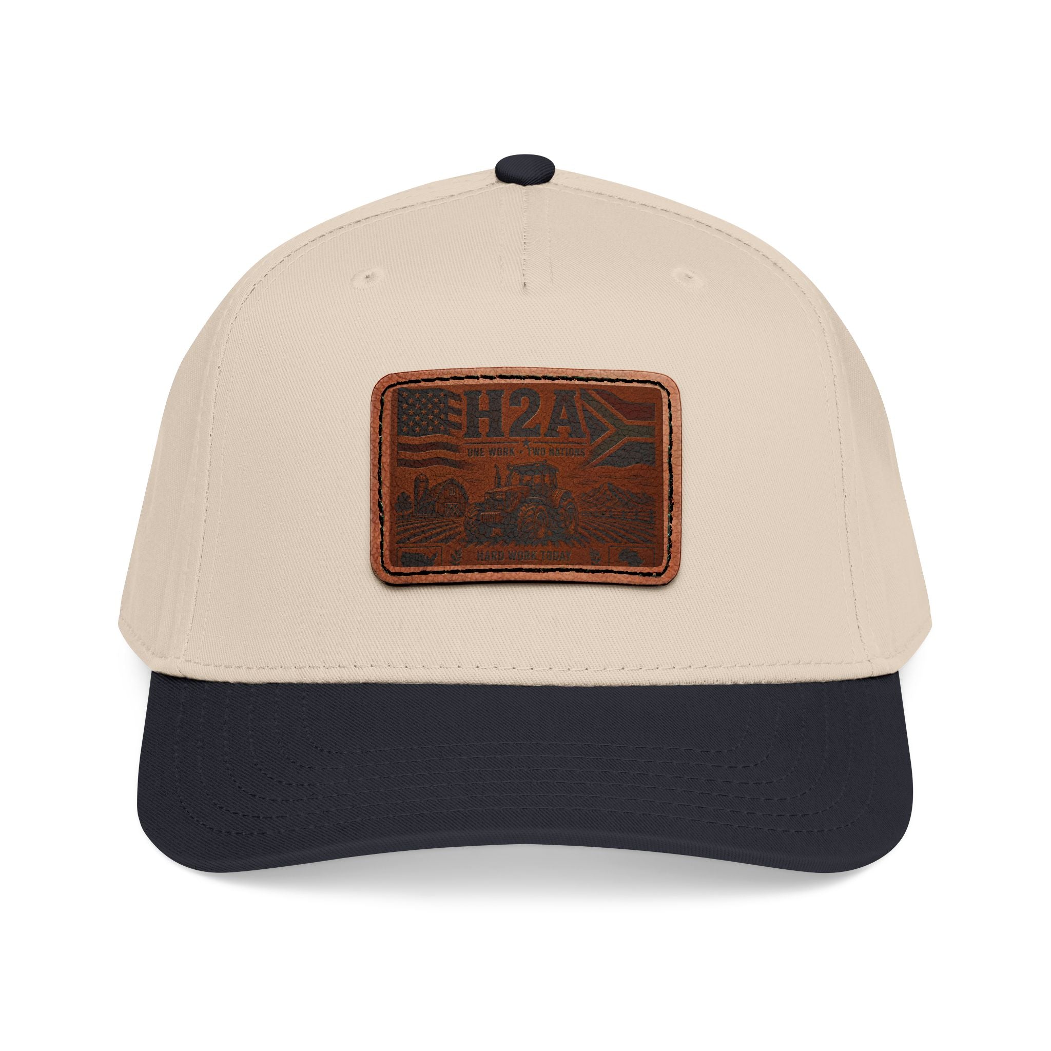 Leather patch baseball cap in beige with dark navy brim and rectangular H2A truck patch