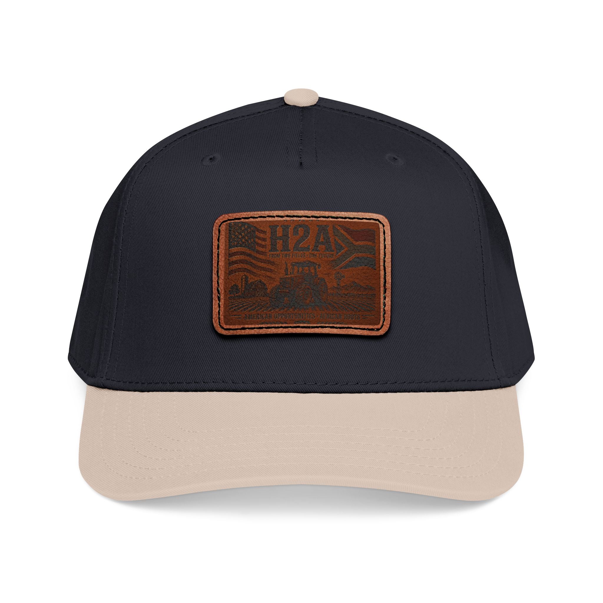 Navy and tan baseball cap with rectangular vintage logo leather patch on front
