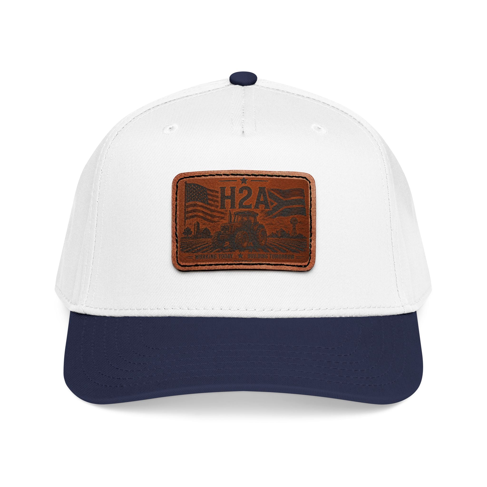 White trucker baseball cap with dark navy brim and brown leather-look H2A patch.
