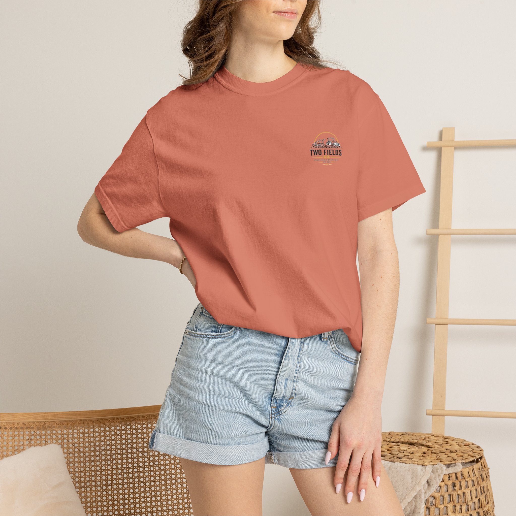 Coral T-shirt on model with small chest farm logo