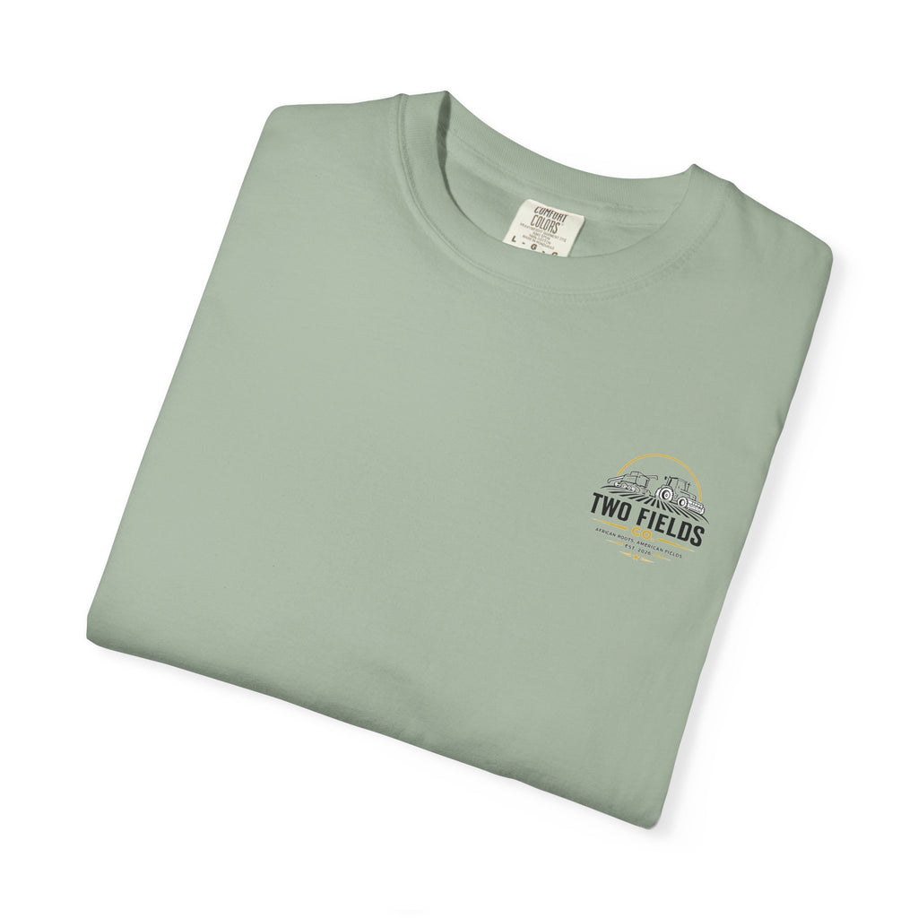 Pale green short-sleeve T-shirt with chest logo and neck label