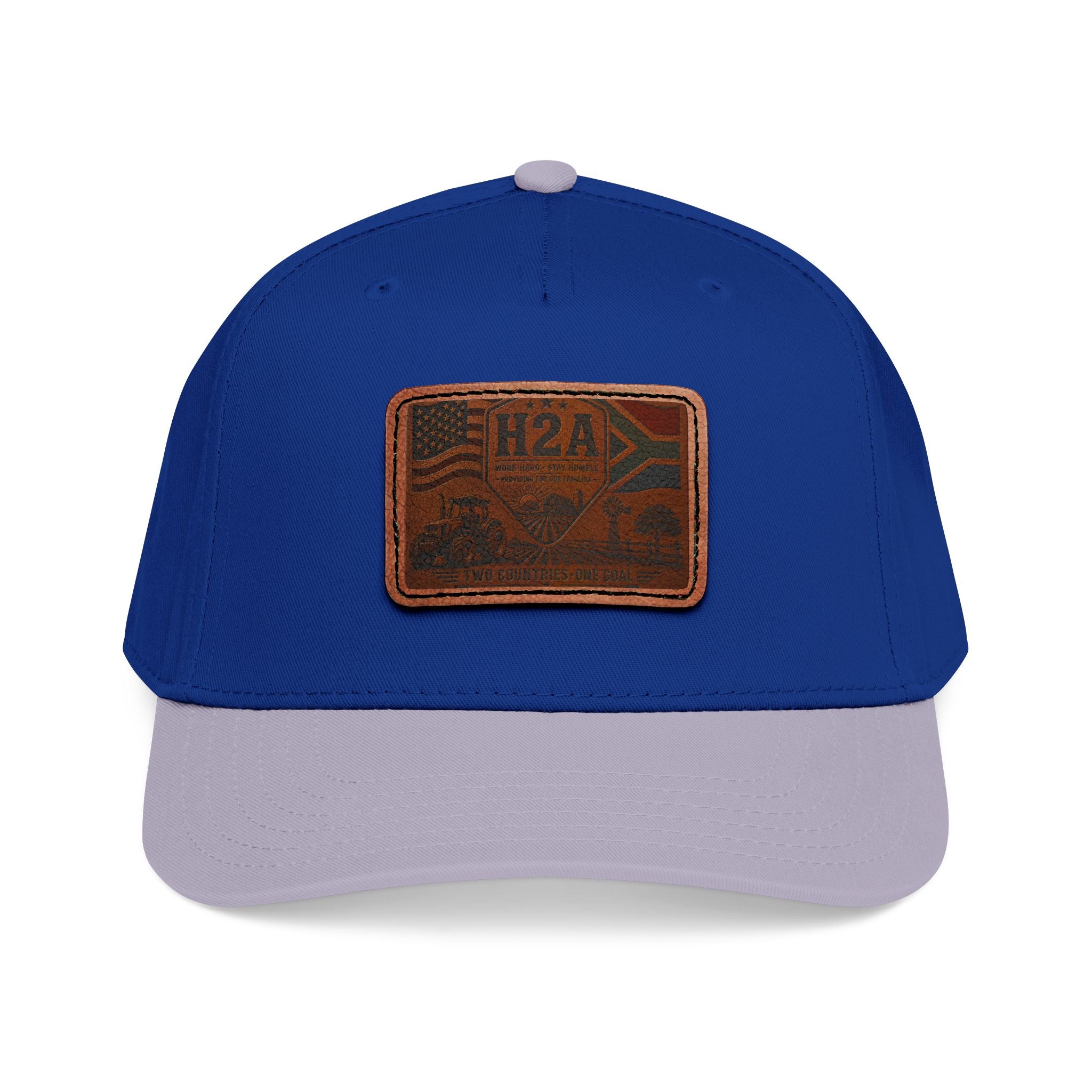 Mid-profile baseball cap in royal blue with light gray brim and rectangular leather H2A patch
