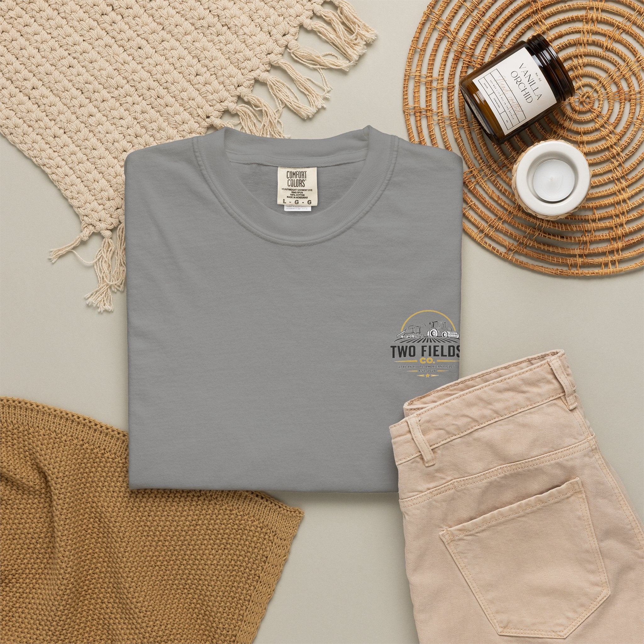 Heather blue T-shirt with small chest logo graphic and crew neck