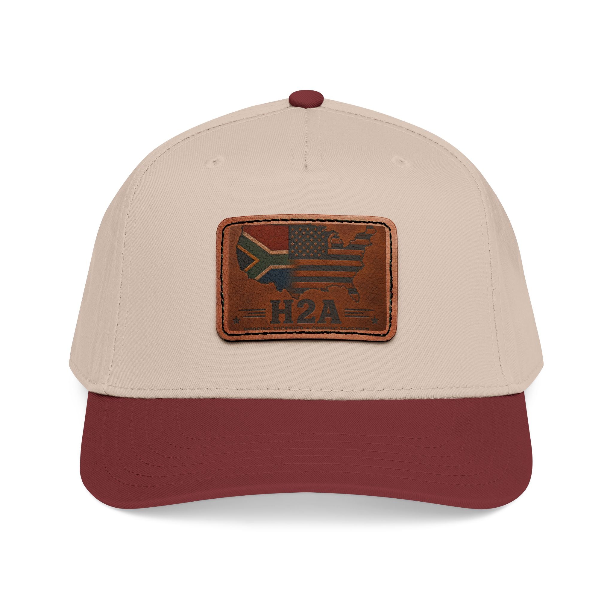 Two-tone baseball cap with rectangular leather patch and H2A flag design, beige and maroon