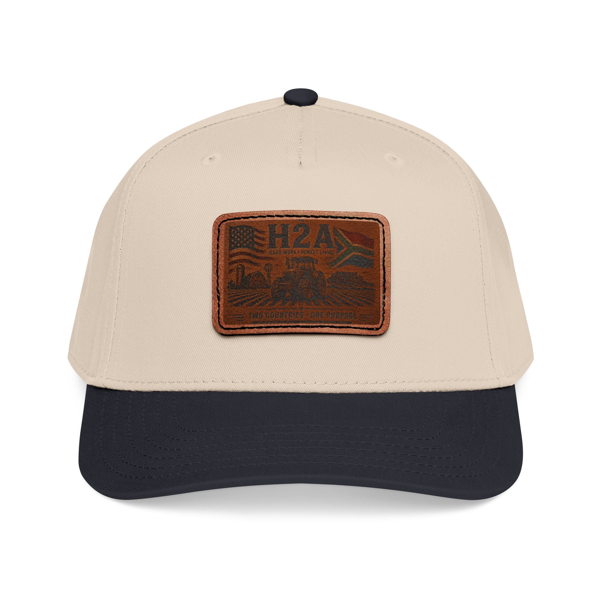 Beige baseball cap with dark navy brim and rectangular leather patch H2A outdoor logo