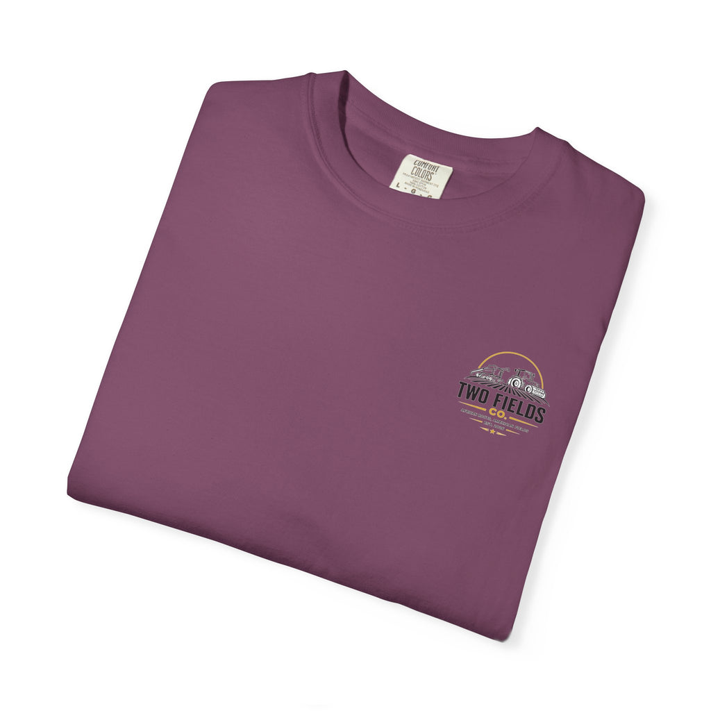 Plum T-shirt, folded, with small Two Fields logo on left chest