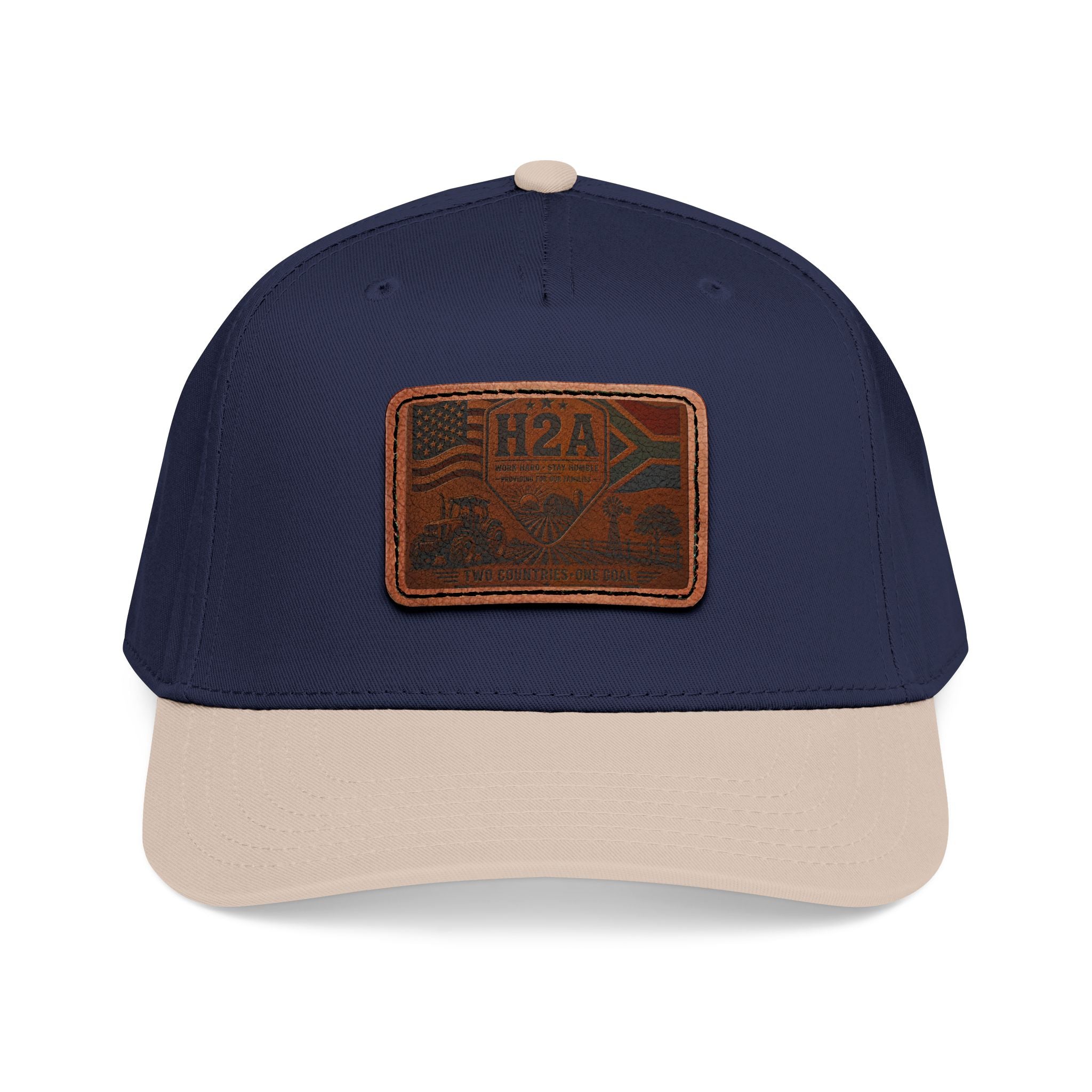 Two-tone leather patch baseball cap, navy crown with light tan brim and H2A flag patch