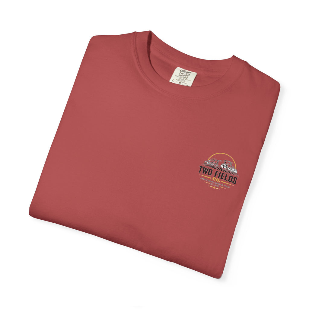 Folded dusty red short-sleeve T-shirt with small Two Fields Co. chest logo