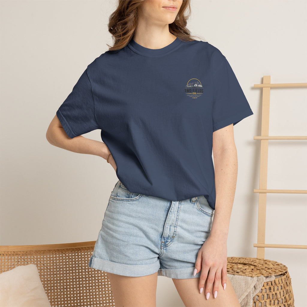 Navy T-shirt worn with small Two Fields Co. logo on chest