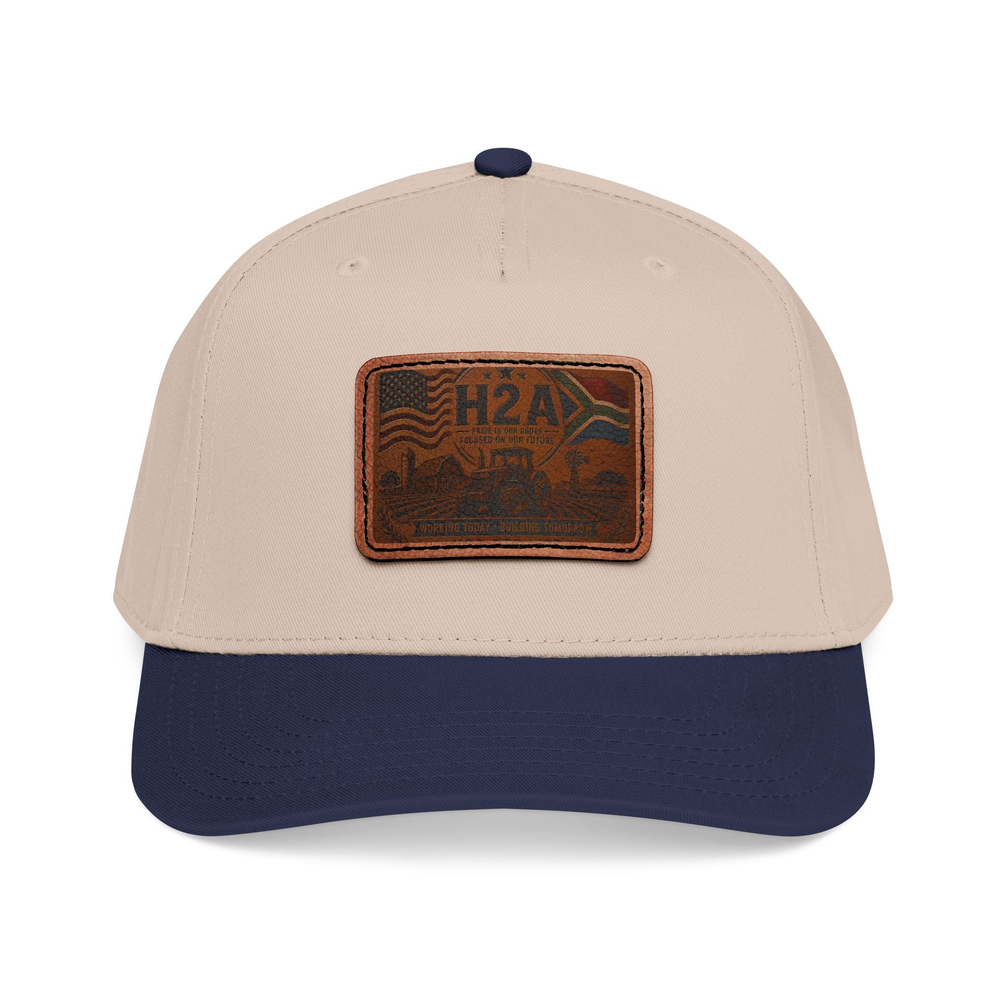 Two-tone baseball cap with H2A leather-style rectangle patch, light tan crown and dark navy brim