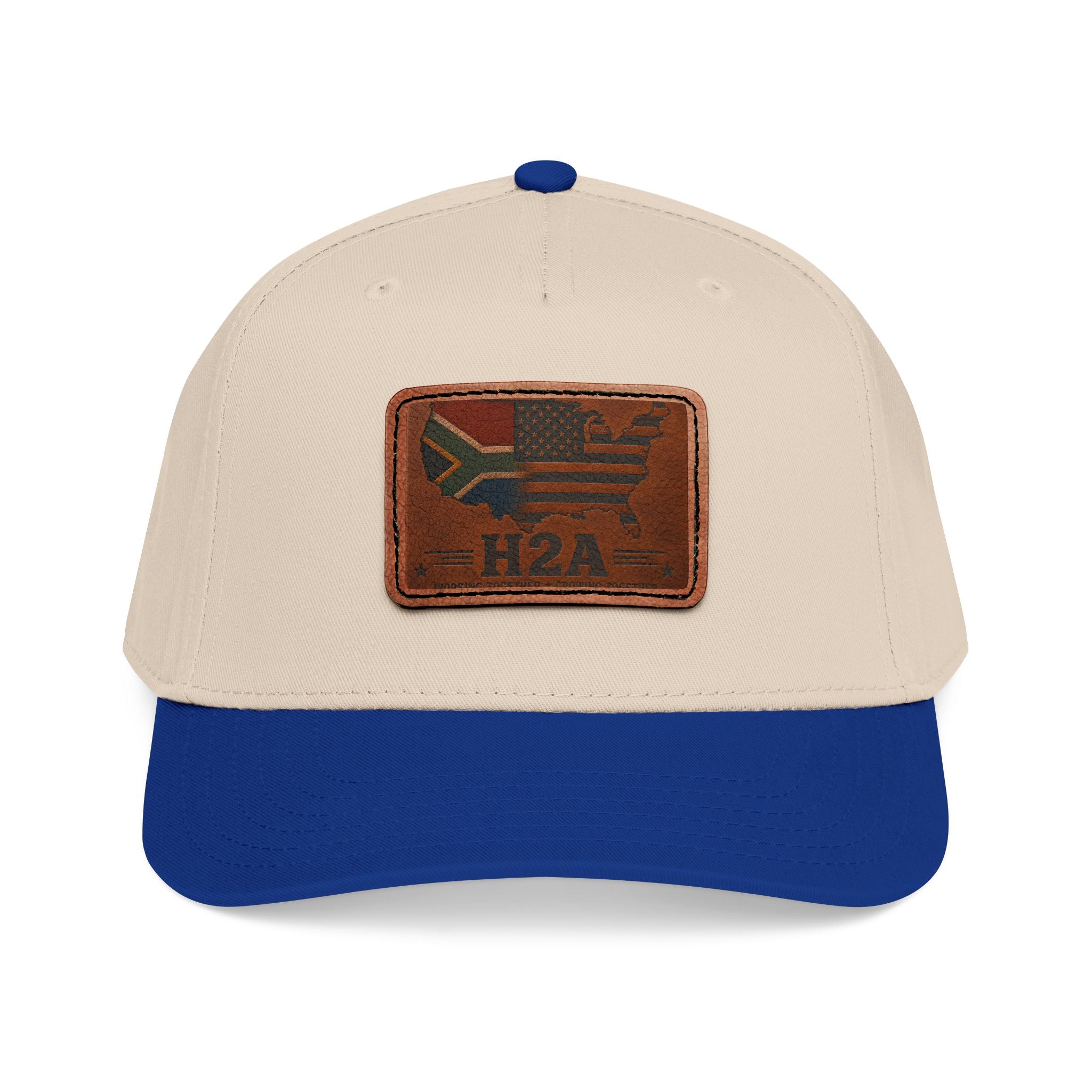 Beige crown baseball cap with navy brim and rectangular H2A flag leather patch