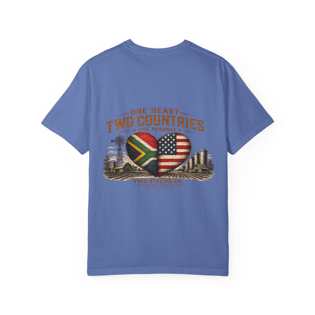 Light blue T-shirt with large heart flags graphic and text across the chest