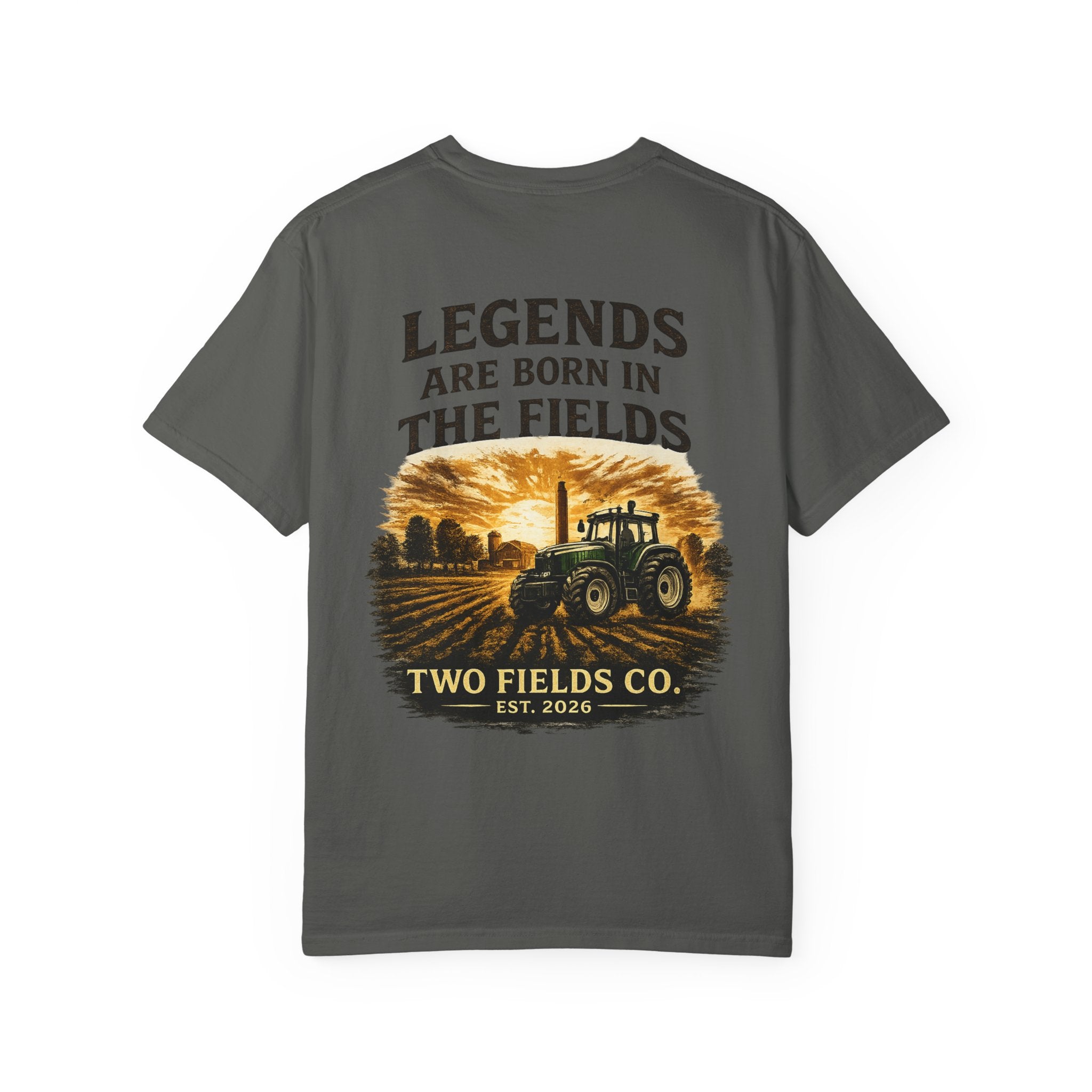 Dark gray graphic farm tractor T-shirt with 'Legends Are Born in the Fields' text.