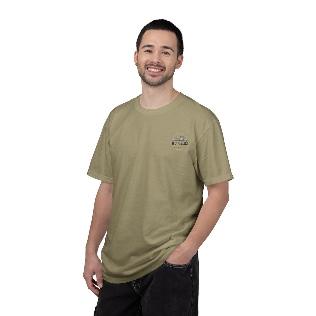 Olive family farm graphic T-shirt worn with small chest logo