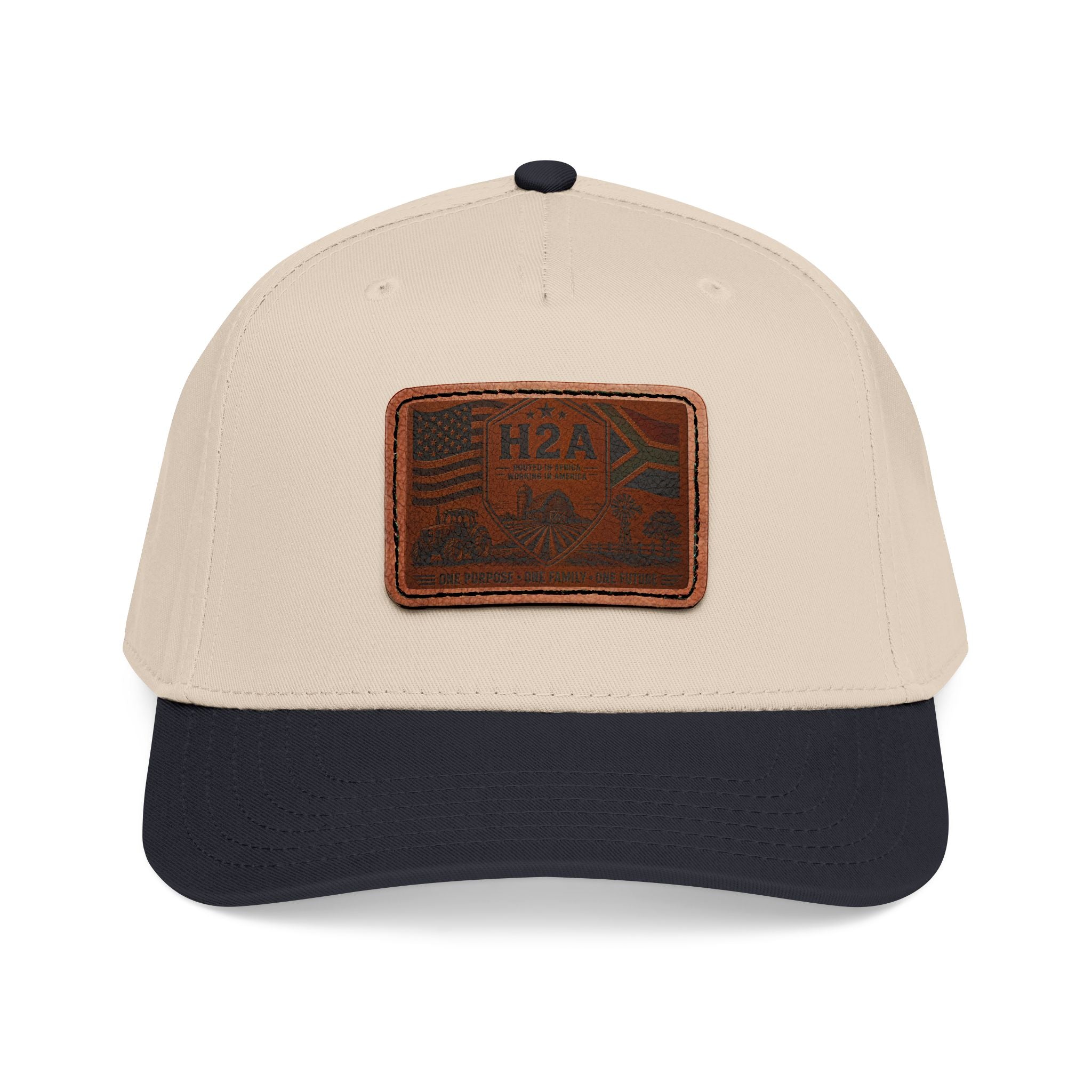 Khaki baseball cap with rectangular brown H2A flag leather patch and dark navy brim
