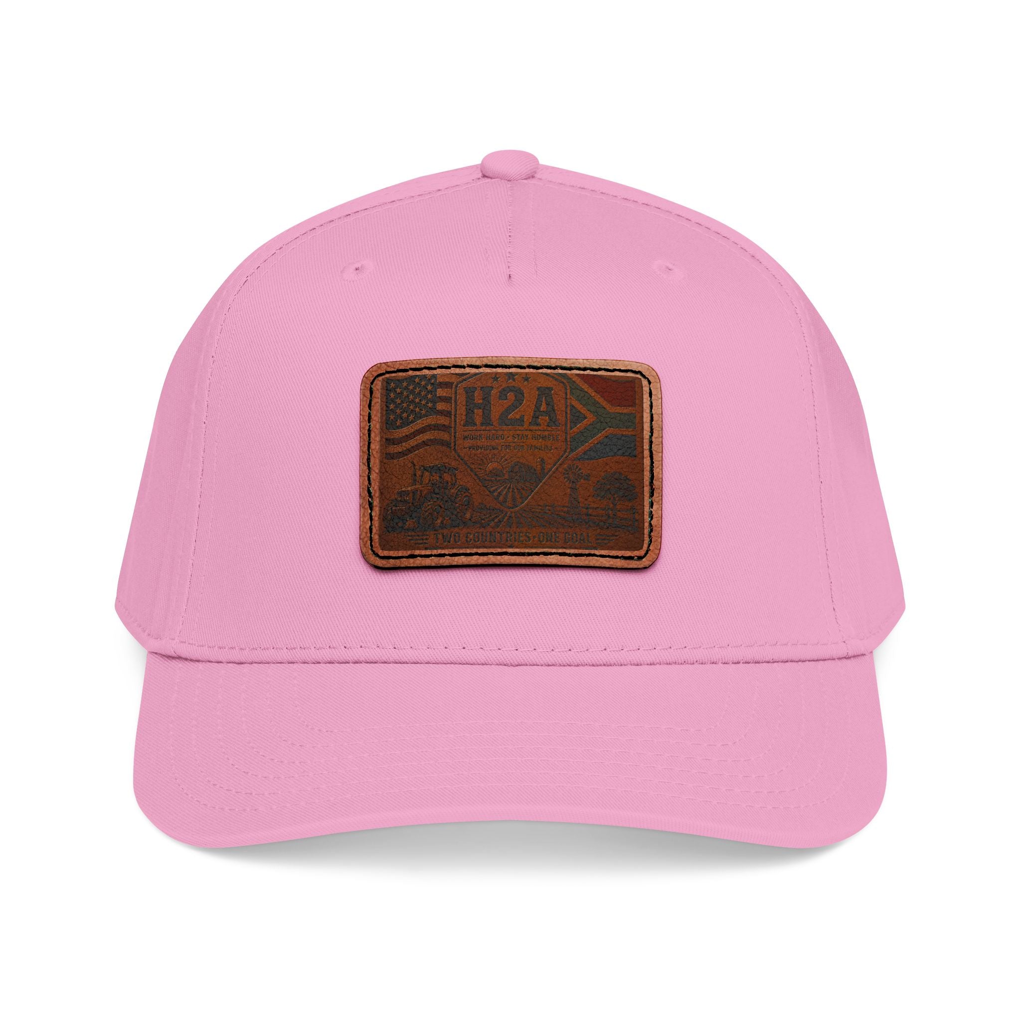 Pink baseball cap with matching pink brim and rectangular H2A flag leather patch on front