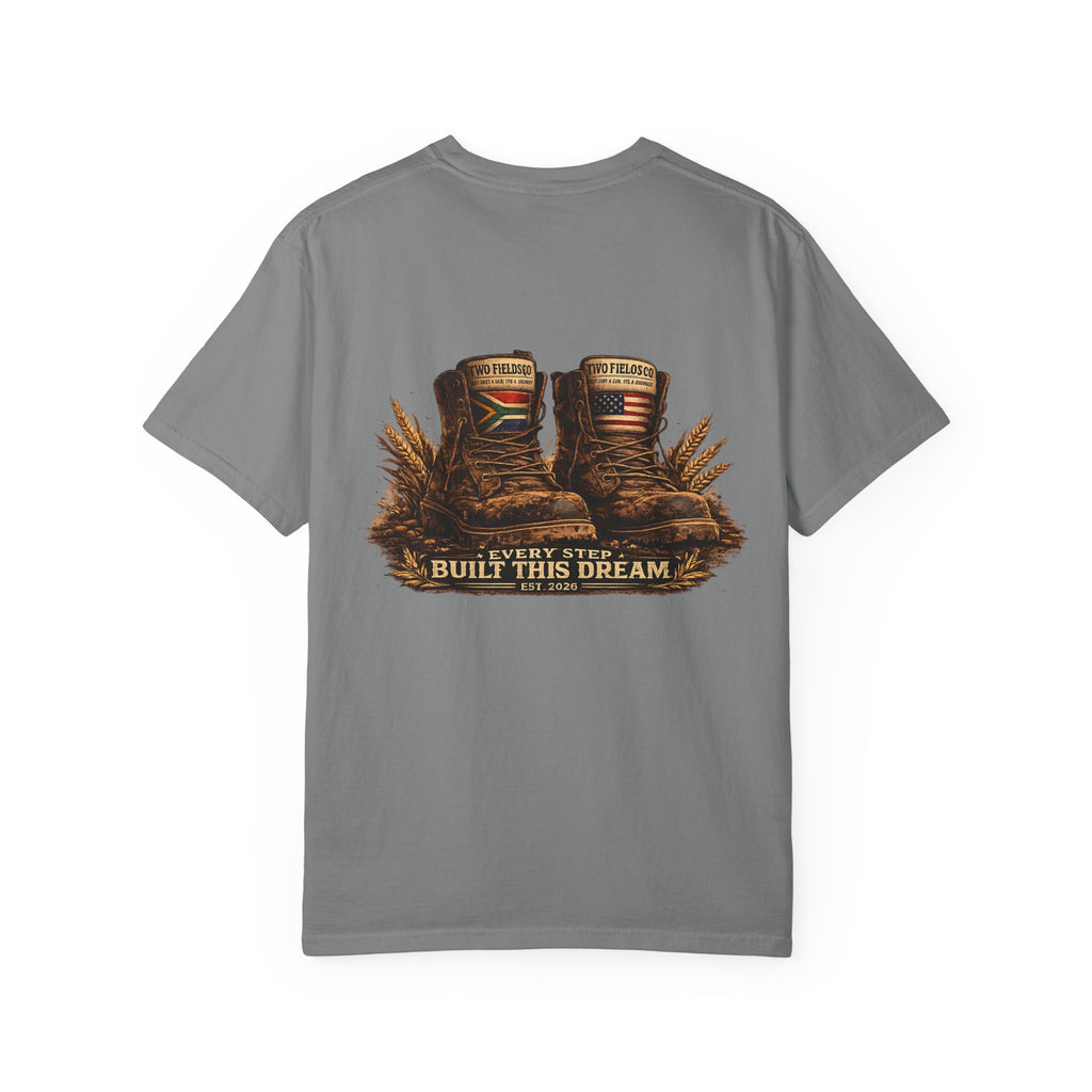Gray crew-neck T-shirt with boots graphic and “Every Step Built This Dream” text
