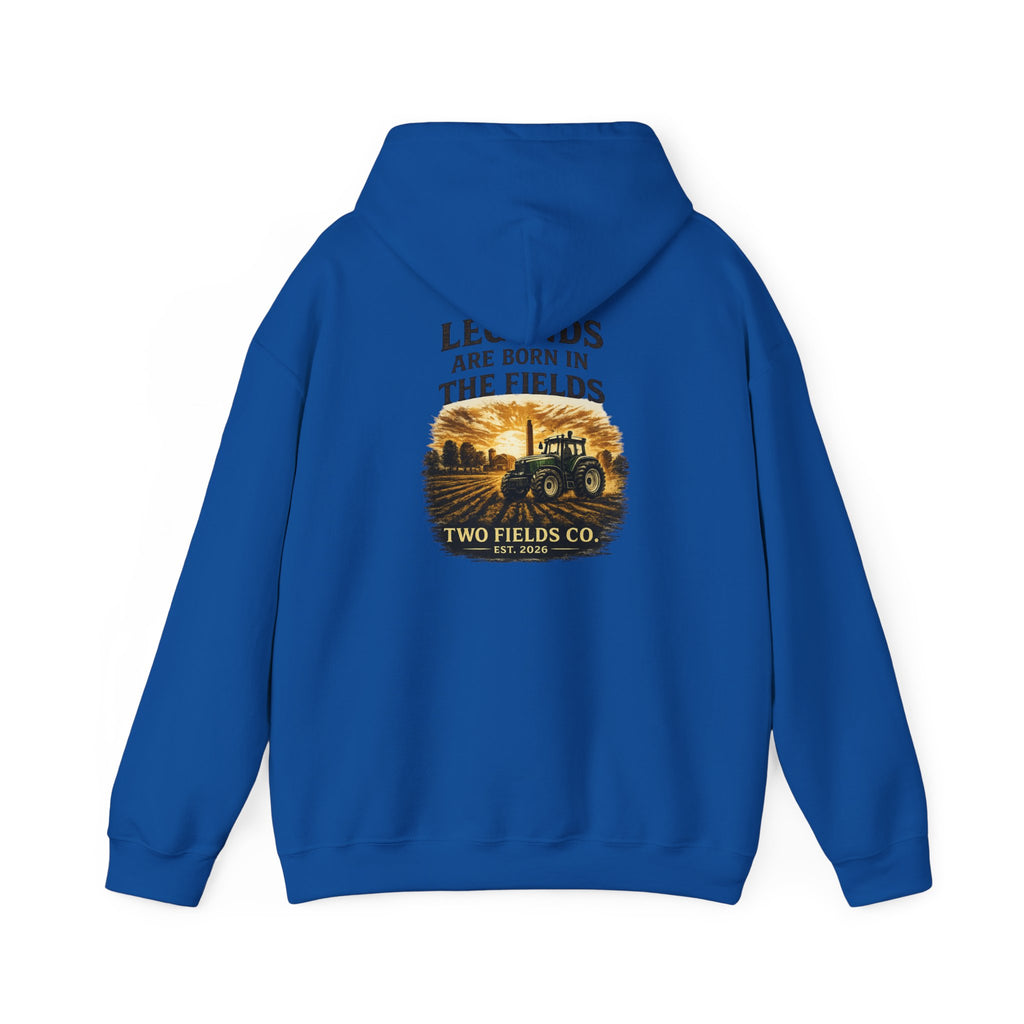 Royal blue pullover hoodie with tractor scene graphic and 'Two Fields Co.' logo