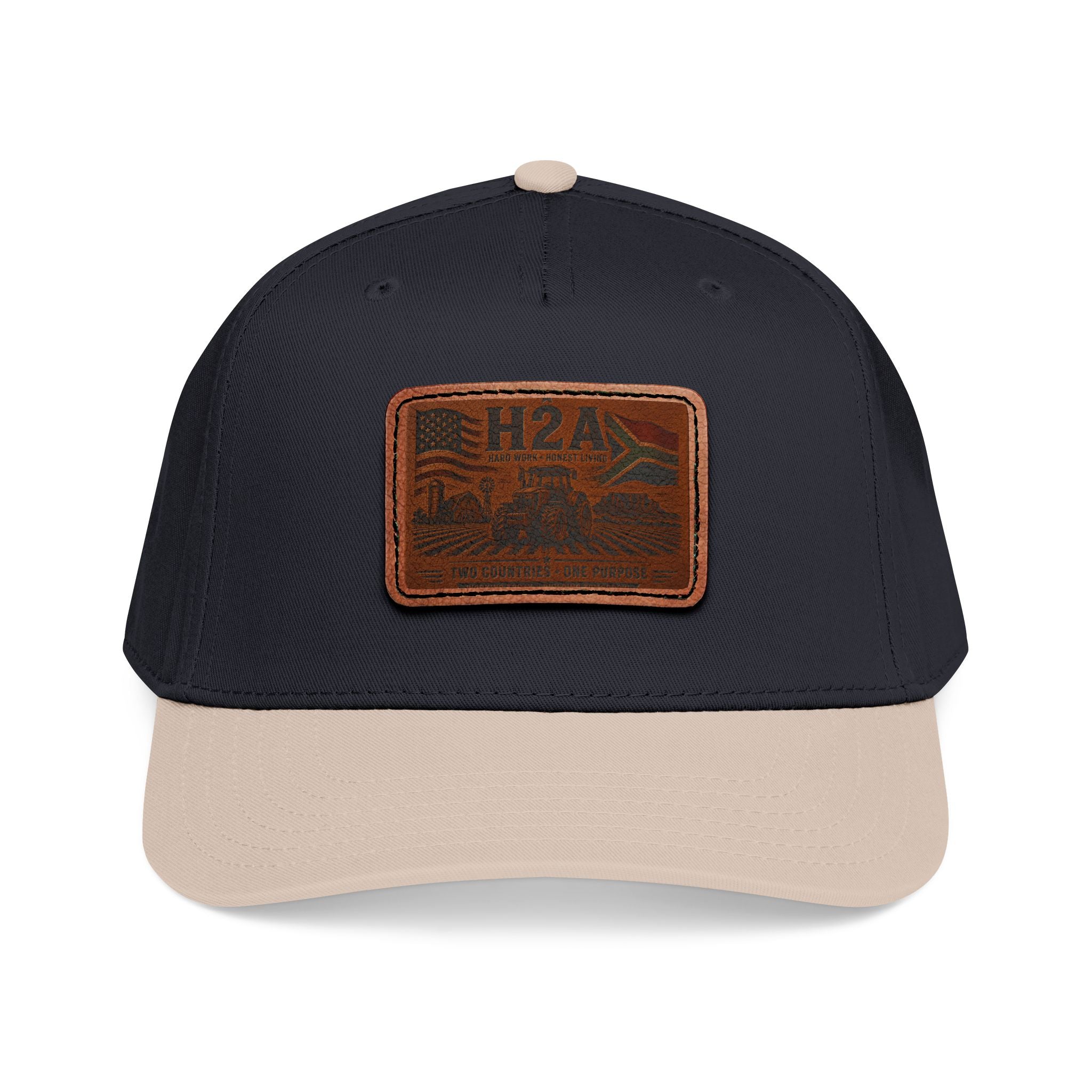 Leather patch baseball cap in dark navy with beige brim, rectangle H2A logo patch