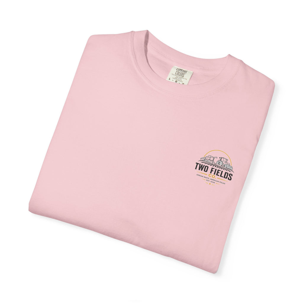 Men's pink crew-neck T-shirt with small right-chest 'Two Fields Co.' tractor mark