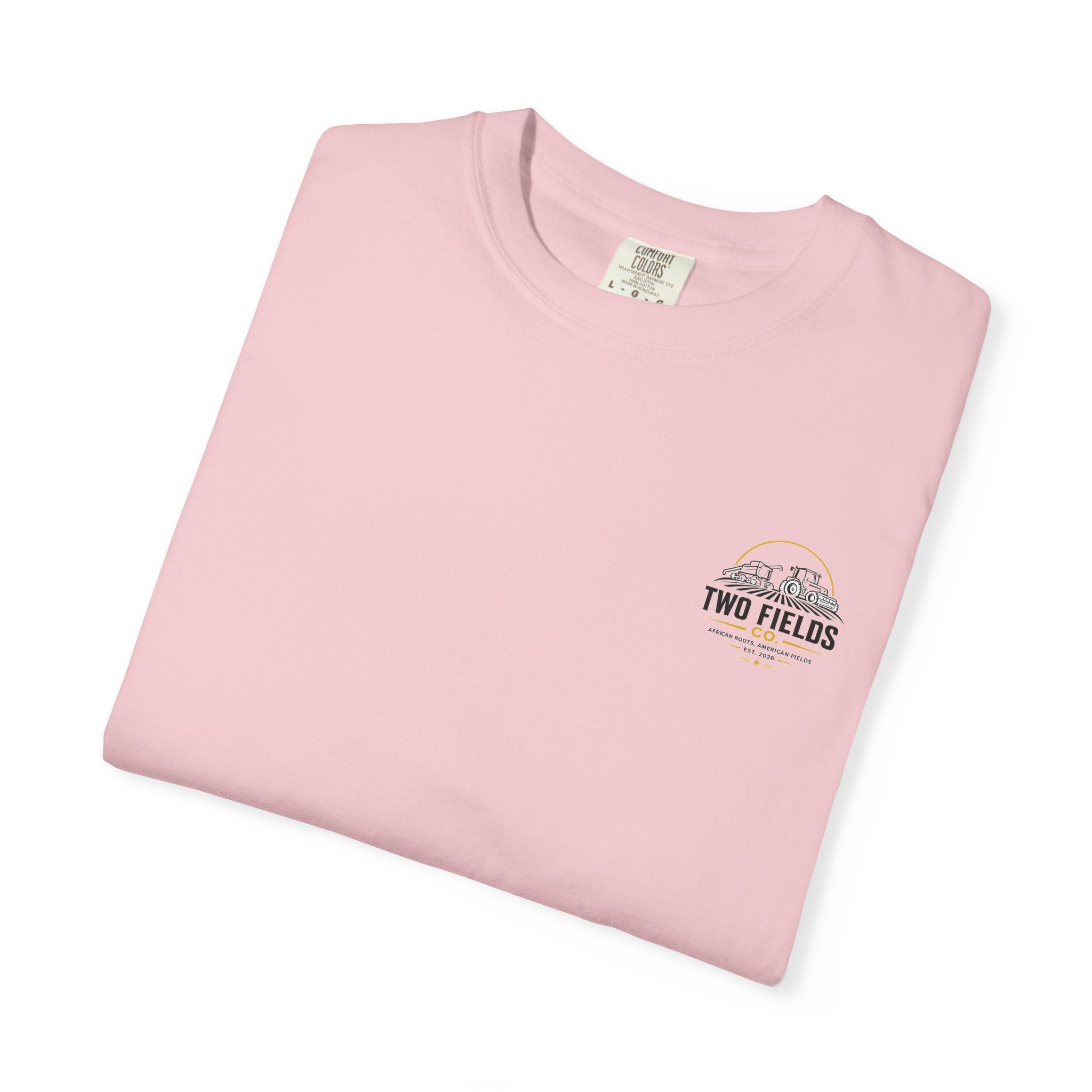Men's pink crew-neck T-shirt with small right-chest 'Two Fields Co.' tractor mark