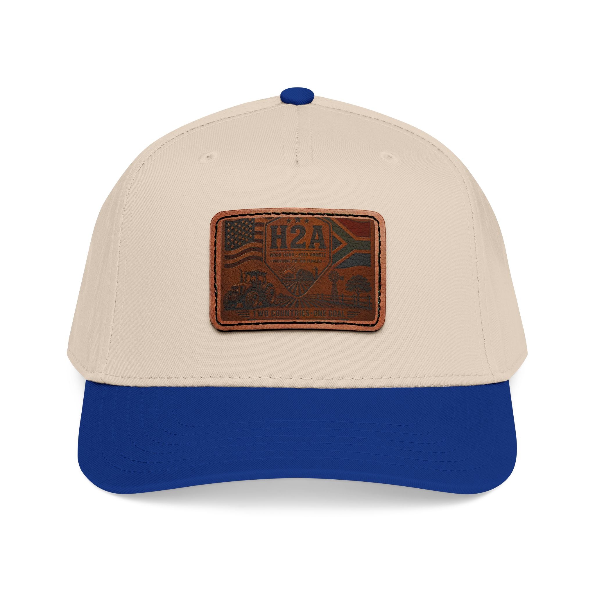 Beige baseball cap with royal blue brim and rectangular H2A flag leather patch on front