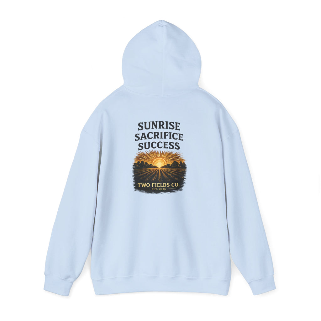 Light blue hooded sweatshirt with “Sunrise Sacrifice Success” back graphic and “Two Fields Co.”