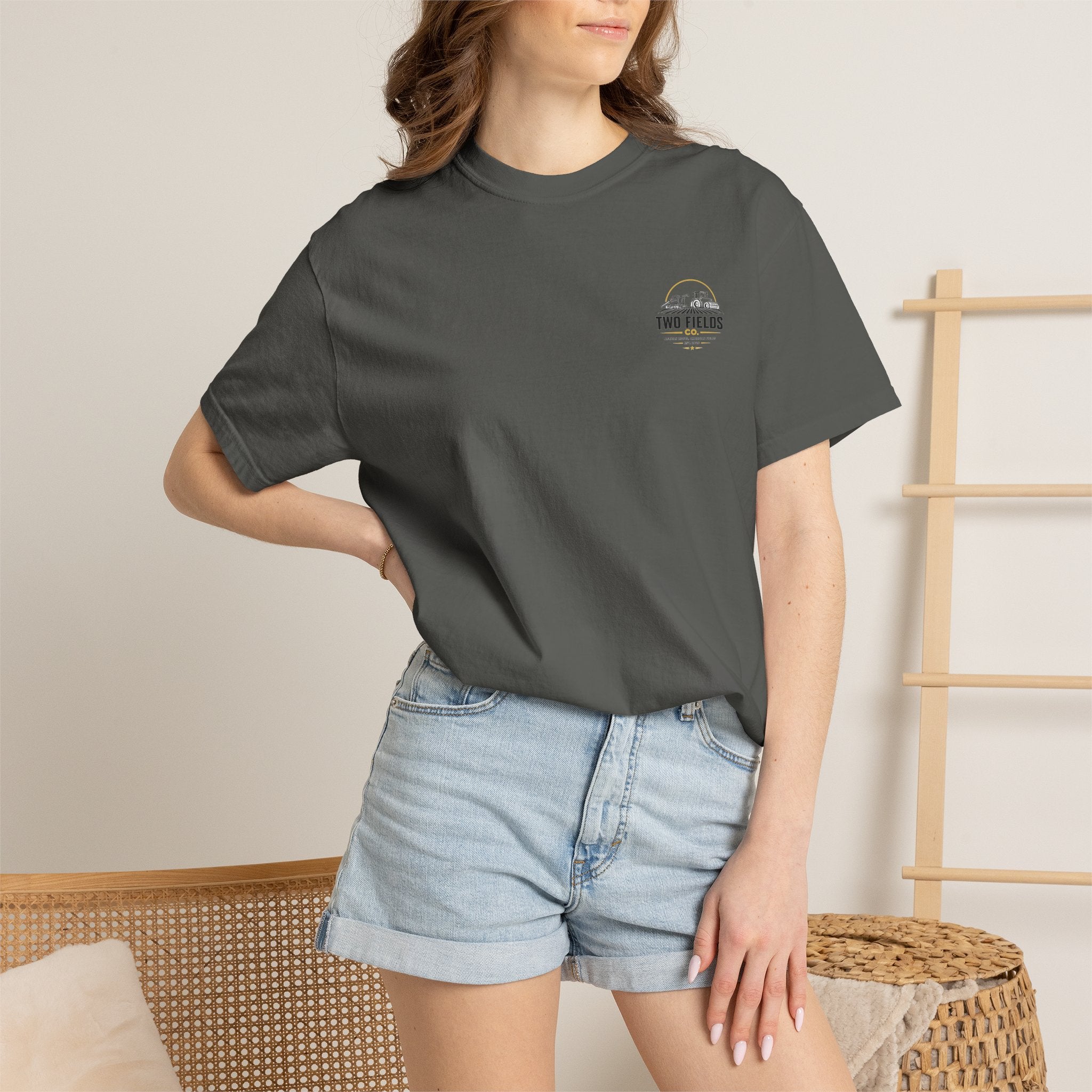 Charcoal graphic t-shirt worn with small chest logo patch