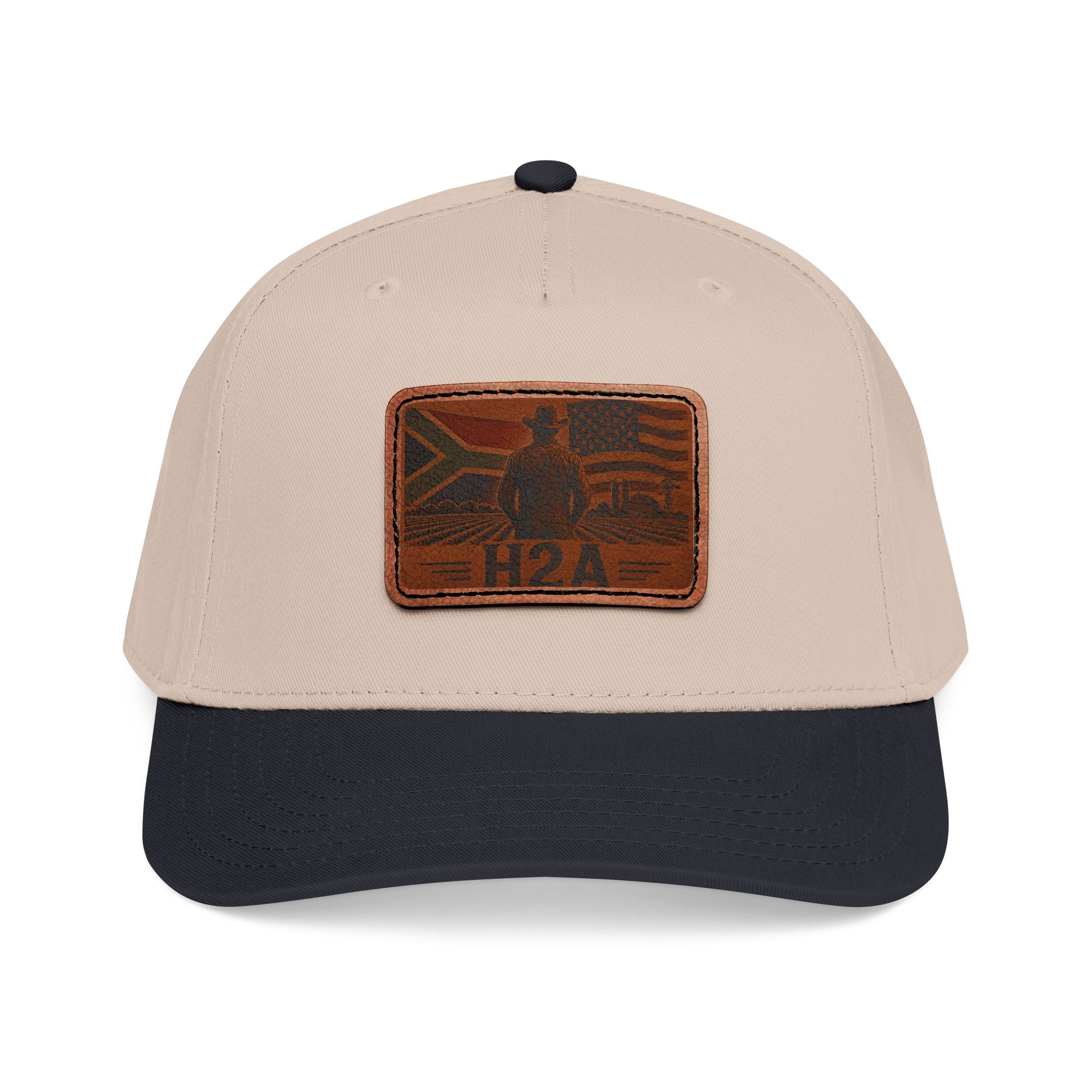 Leather patch baseball cap in cream with dark navy brim and rectangular H2A logo patch