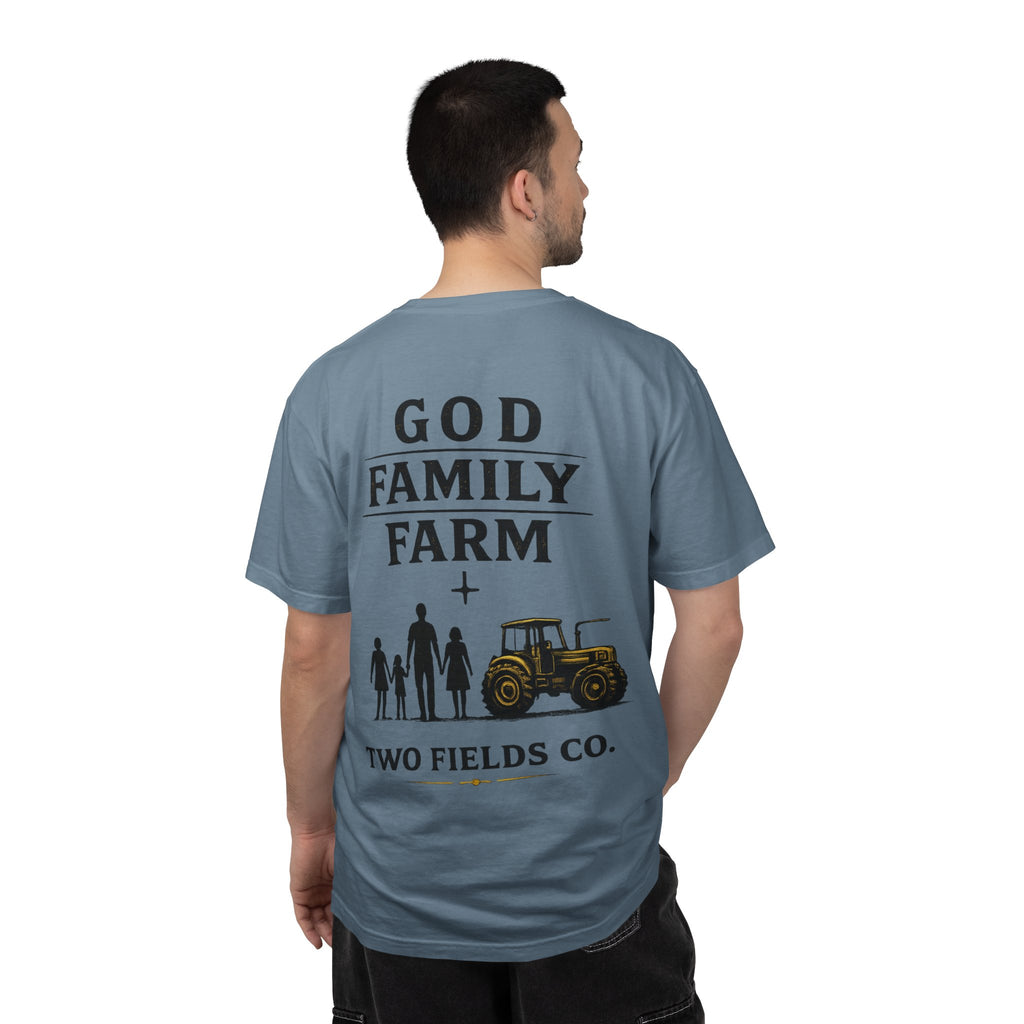Blue T-shirt with back print showing family silhouettes, tractor, and “TWO FIELDS CO.”