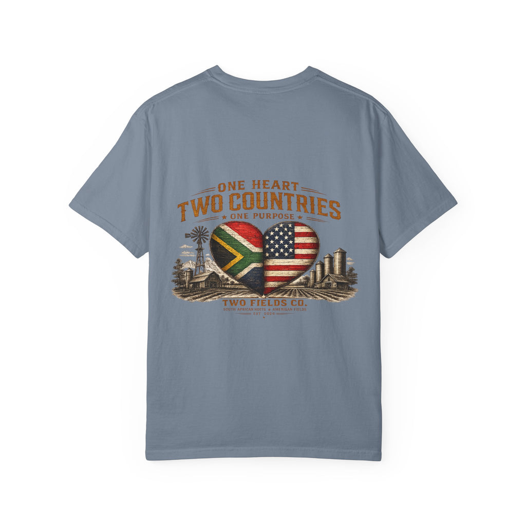 Blue T-shirt with large heart flags graphic and text across the chest