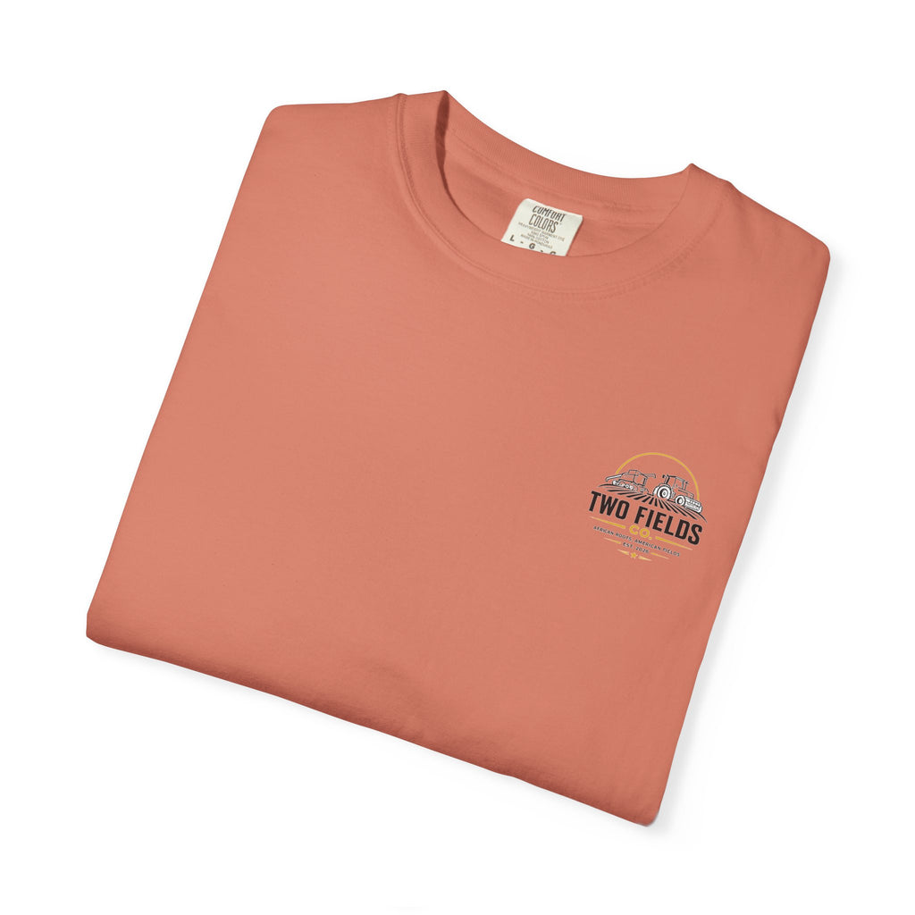 Rust crewneck T-shirt, flat lay, small chest logo patch