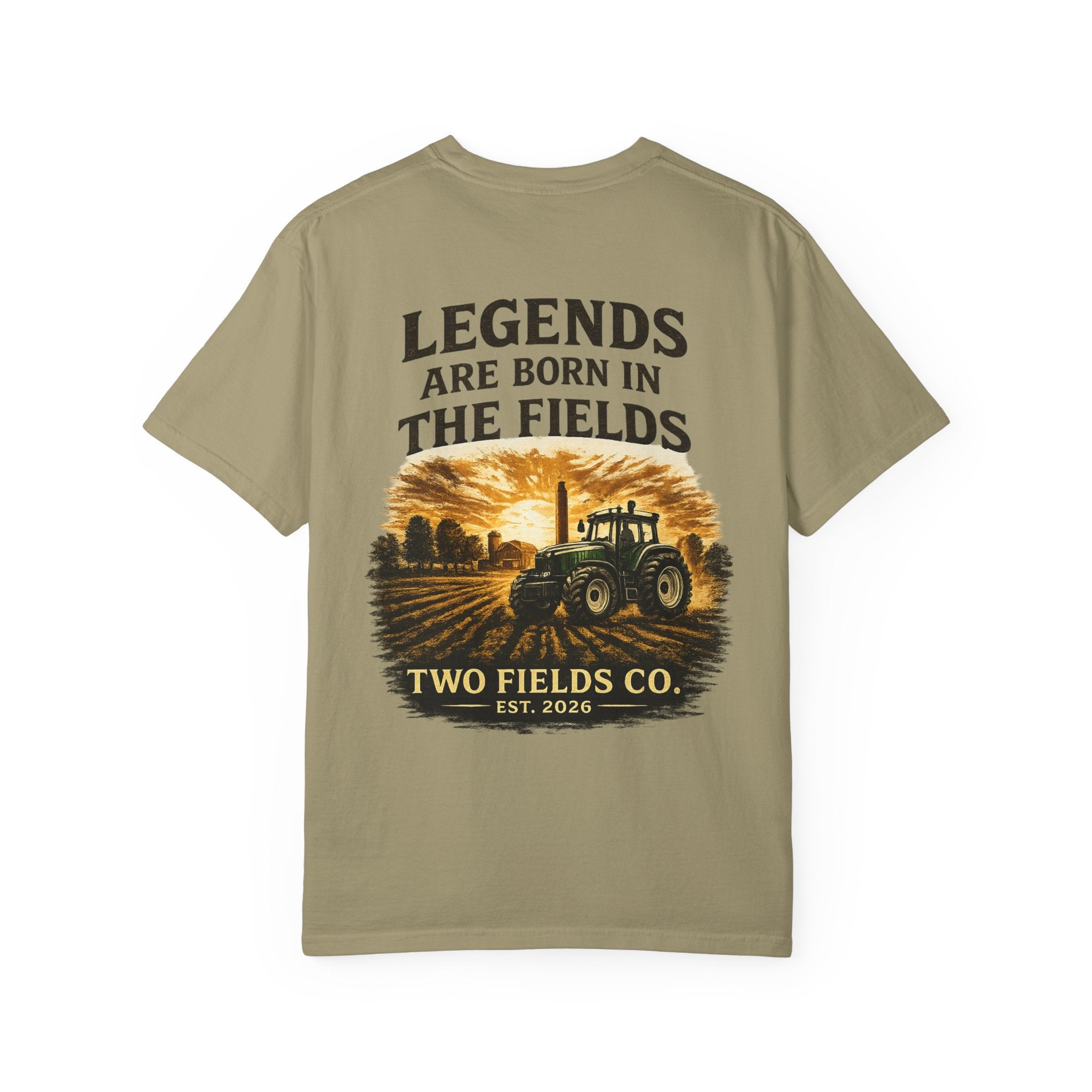 Sage green graphic farm tractor T-shirt with 'Legends Are Born in the Fields' text.
