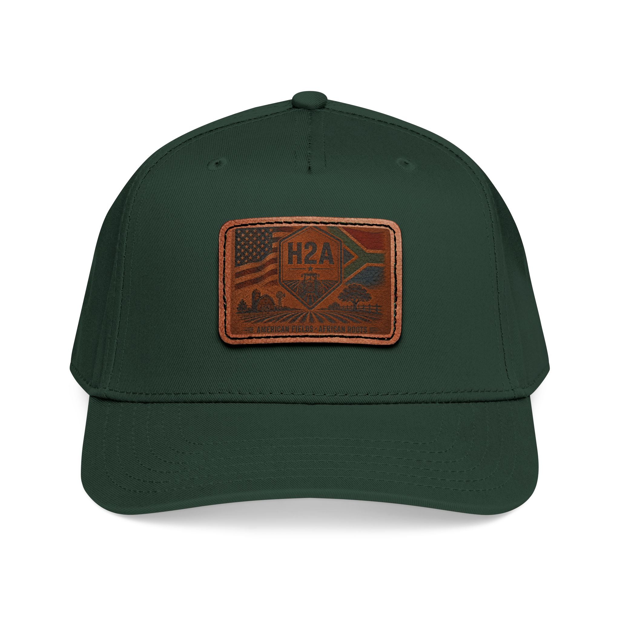 Two-tone baseball cap, dark green crown with tan brim, rectangular H2A patch