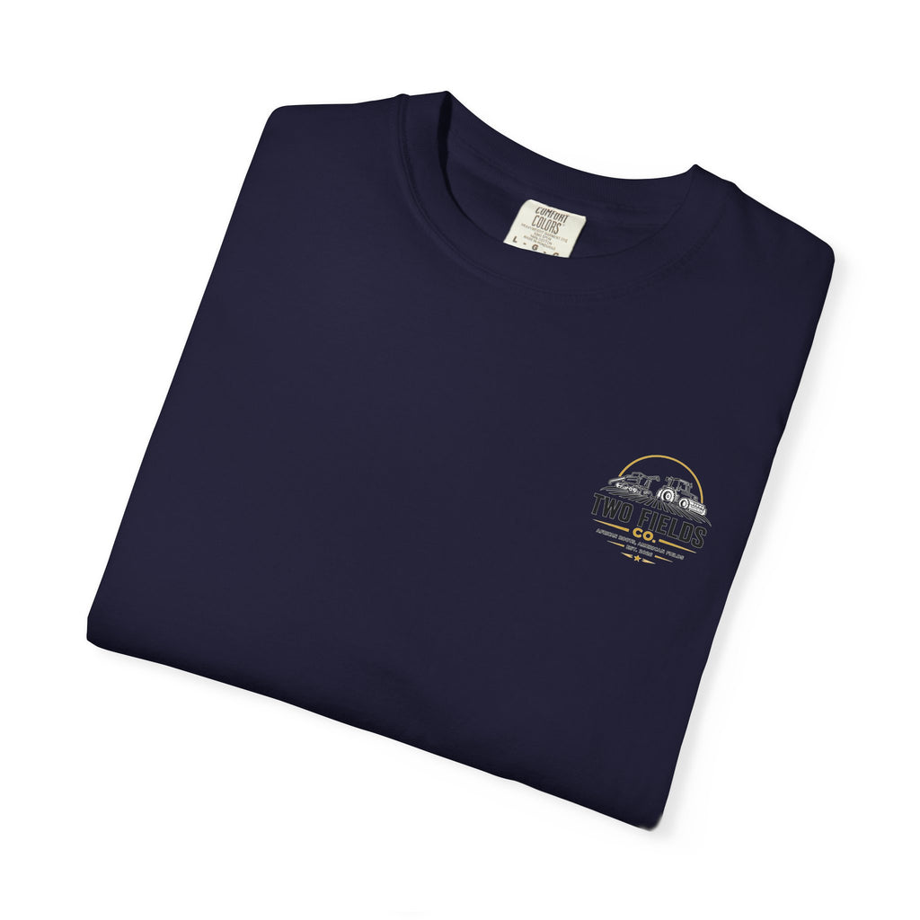 Navy T-shirt folded with small Two Fields Co. logo on chest