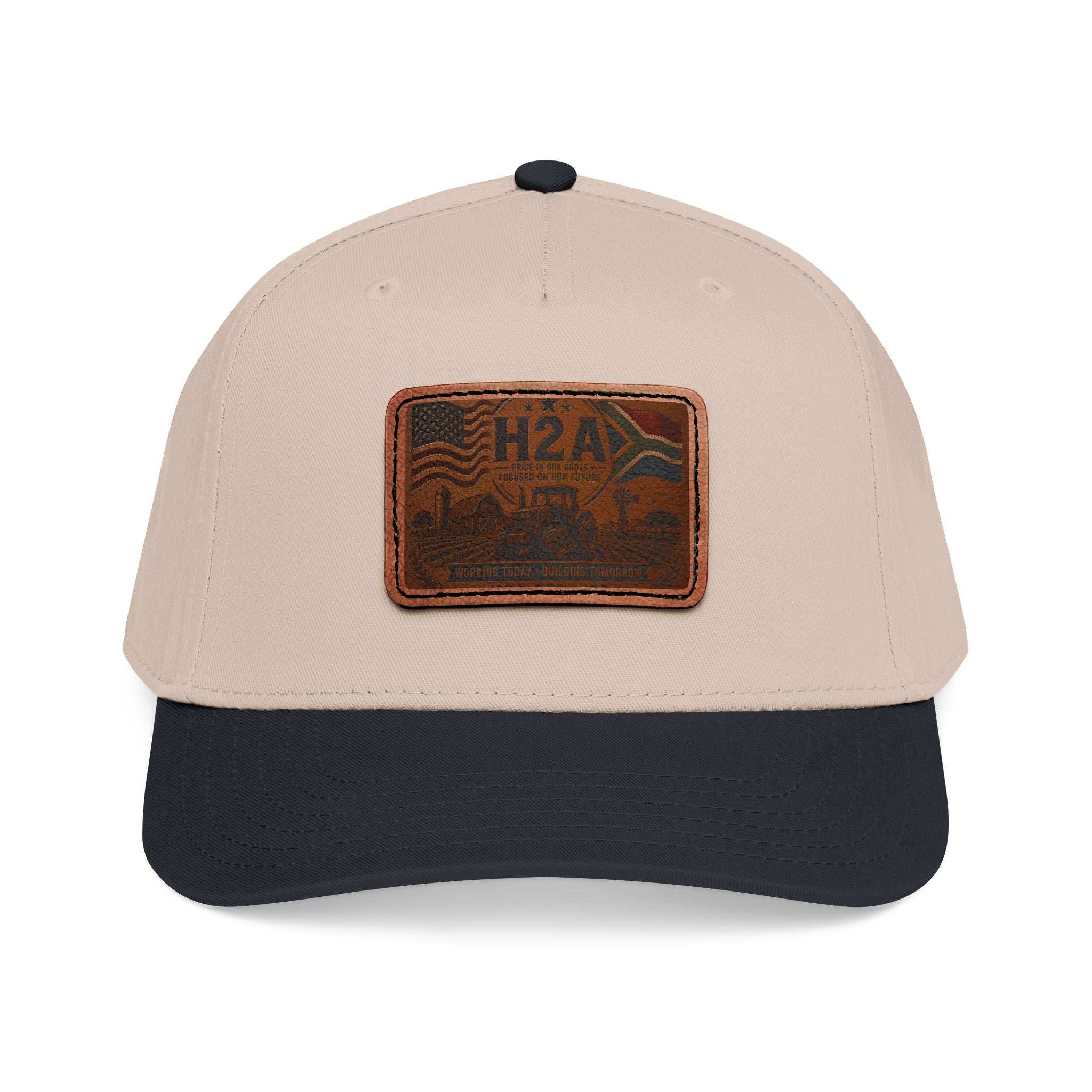 Two-tone baseball cap with H2A leather-style rectangle patch, light tan crown and dark navy brim